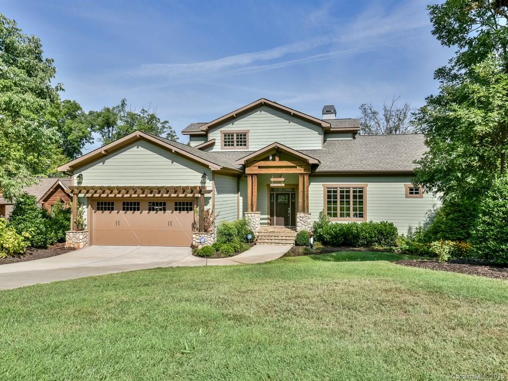 Luxury lakefront living close to outlet mall/freeways/uptown. Custom built better than new craftsman style home w/ main channel Lake Wylie sunset views. Gorgeous hardwood floors on main level, master suite w/ executive office, open walled personal "rain" shower, built-ins, custom lighting. Most bedrooms have private baths & covered decks. Tumbled stone rear patio for entertaining. Walkout basement w/media center, large game room, guest room & bath, workshop. Dock w/covered boat slip & lift.