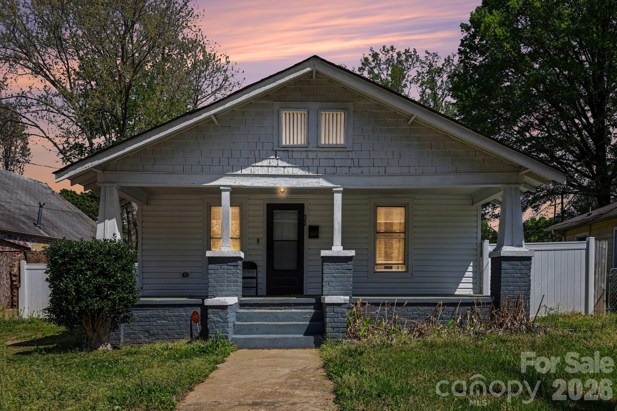 Home with a functional layout and good natural light throughout. Features 2 bedrooms and 2 full bathrooms with updates including smooth ceilings and tile flooring in the baths. The kitchen offers ample cabinet and prep space and connects easily to the main living areas. Covered front porch adds usable outdoor space, along with a manageable 0.10-acre lot. Convenient location with quick access to downtown, shopping, dining, and major routes. Suitable for a primary residence or investment property.