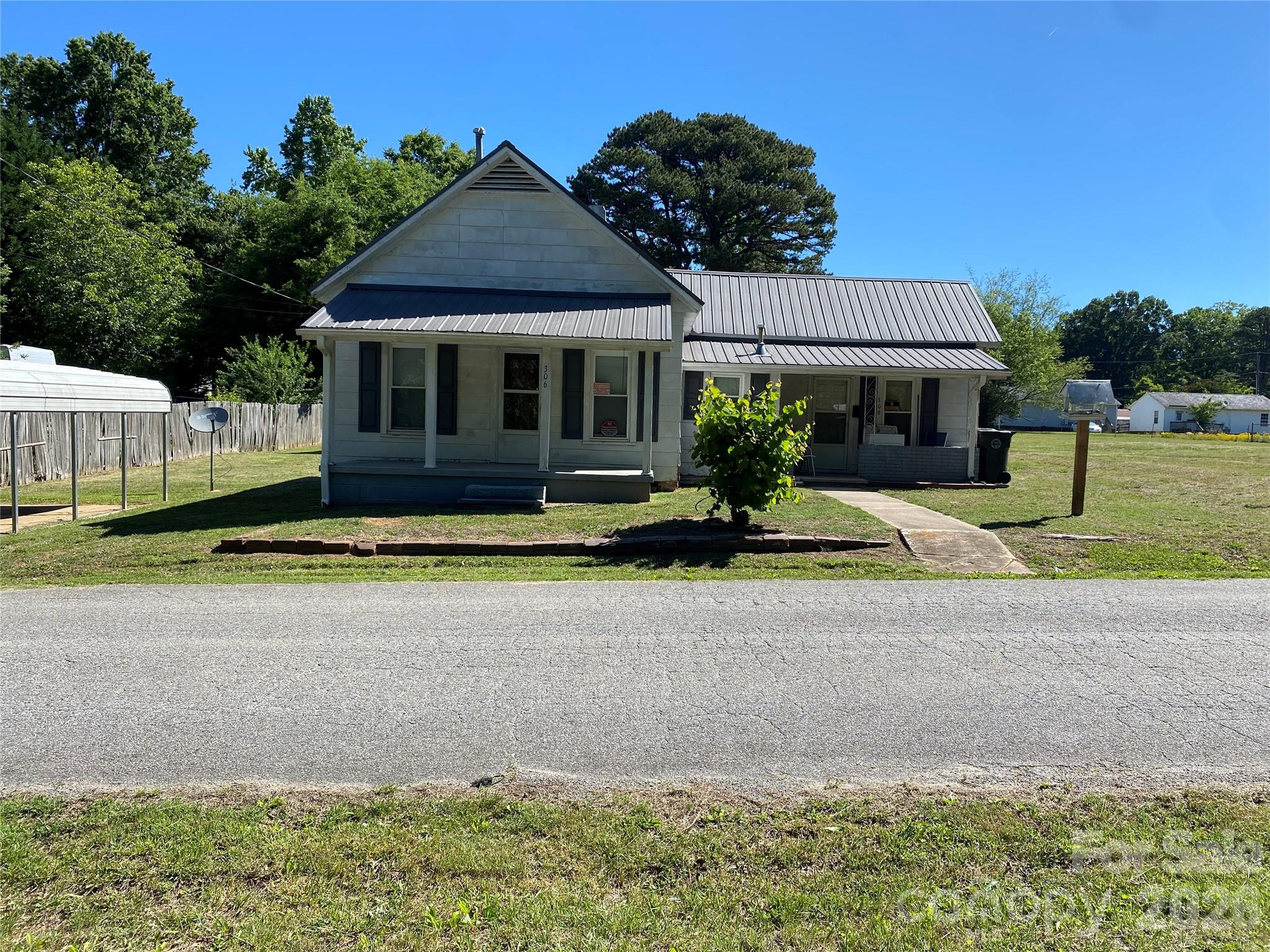 Investor special with endless potential in the heart of Cherryville! This charming 2-bedroom, 1-bath home is located on a quiet street and offers a great opportunity for investors, first-time buyers, or anyone looking for a fixer-upper project. Enjoy relaxing on the inviting front porch or envision the possibilities inside the cozy living room and functional layout. The property also includes an outbuilding for extra storage or workshop space and features a gas water heater. With a little vision and TLC, this home could truly shine!