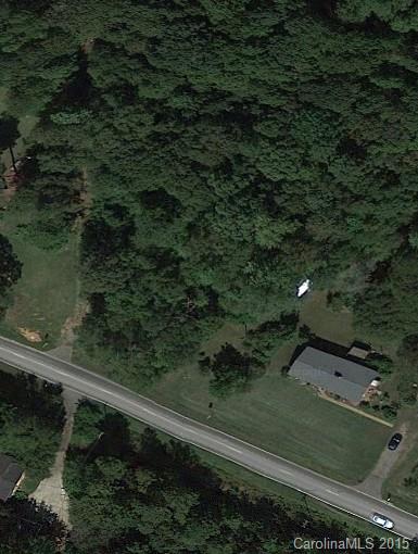 3.25 Acres on Highway 160 East just after the new Fort Mill bypass crosses over Highway 160. 250.92 feet of frontage on Highway 160 and 238.85 along the Springs Green way along the back. Property has a well left over from the old residence but Fort Mill City water and sewer run along front of property and can be connected. Perfect location for redevelopment. Zoned RC-1 but could be rezoned