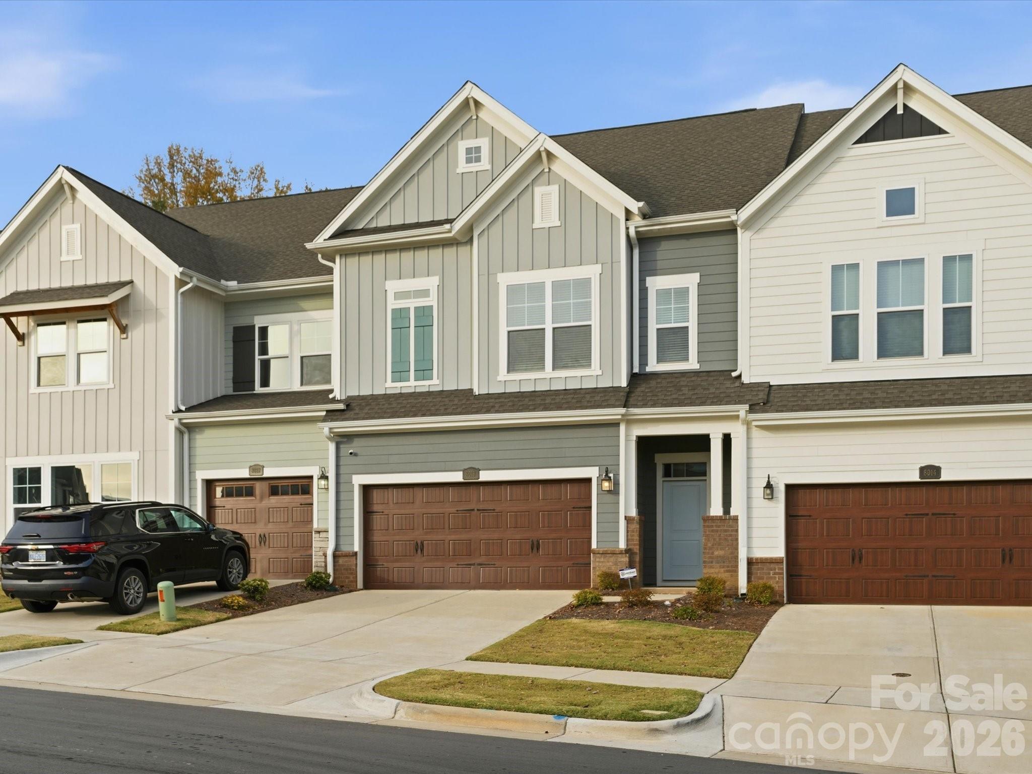 This is a 2023 David Weekley home, with THE BEST PRIMARY SUITE LAYOUT I HAVE EVER SEEN!!!  And now it’s also the best priced unit in the neighborhood!  Welcome to your "like new" townhouse located just 1 mile from Birkdale Village, where Lake Norman is basically in your backyard.  This home has a 2-car garage, extended patio for entertaining, 3 bedrooms with each room having their OWN BATHROOM, a big loft on the 3rd floor where bedroom 3 is located, halfbath on the first floor, BEAUTIFUL herringbone backsplash in the kitchen, gas burner stove, etc etc.  Now----THE PRIMARY:  There are 2 HUGE walk-in closets, with a bench and a mirror in-between, perfect for getting ready, a bathroom so big that 6 people could do jumping jacks at the same time, AND....the laundry room is "jack and jill" style and opens up right across from the primary closets!!!  It's genius.  Pure genius.  Refrigerator and washer/dryer convey.  Contact listing agent with any questions.