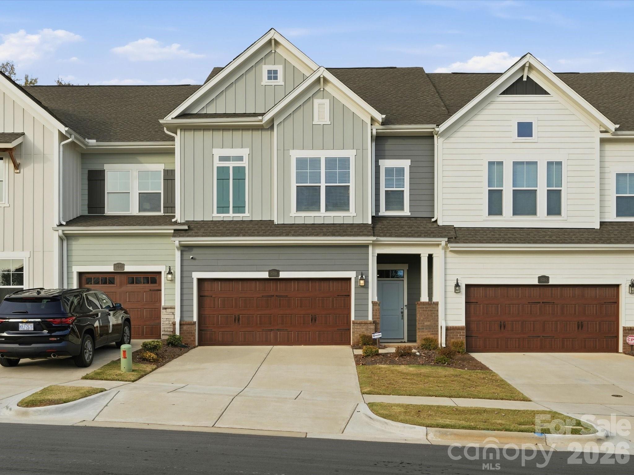 TAKE ADVANTAGE OF LAKE SEASON, and buy this 2023 David Weekley home, with THE BEST PRIMARY SUITE LAYOUT I HAVE EVER SEEN!!!  Do you have a boat or want a boat?  Because the boat ramp and possible boat storage, is only a 120 second drive away!  And now it’s also the best priced unit in the neighborhood!  Welcome to your "like new" townhouse located just 1 mile from Birkdale Village, where Lake Norman is basically in your backyard.  This home has a 2-car garage, extended patio for entertaining, 3 bedrooms with each room having their OWN BATHROOM, a big loft on the 3rd floor where bedroom 3 is located, halfbath on the first floor, BEAUTIFUL herringbone backsplash in the kitchen, gas burner stove, etc etc.  Now----THE PRIMARY:  There are 2 HUGE walk-in closets, with a bench and a mirror in-between, perfect for getting ready, a bathroom so big that 6 people could do jumping jacks at the same time, AND....the laundry room is "jack and jill" style and opens up right across from the primary closets!!!  It's genius.  Pure genius.  Refrigerator and washer/dryer convey.  Contact listing agent with any questions.