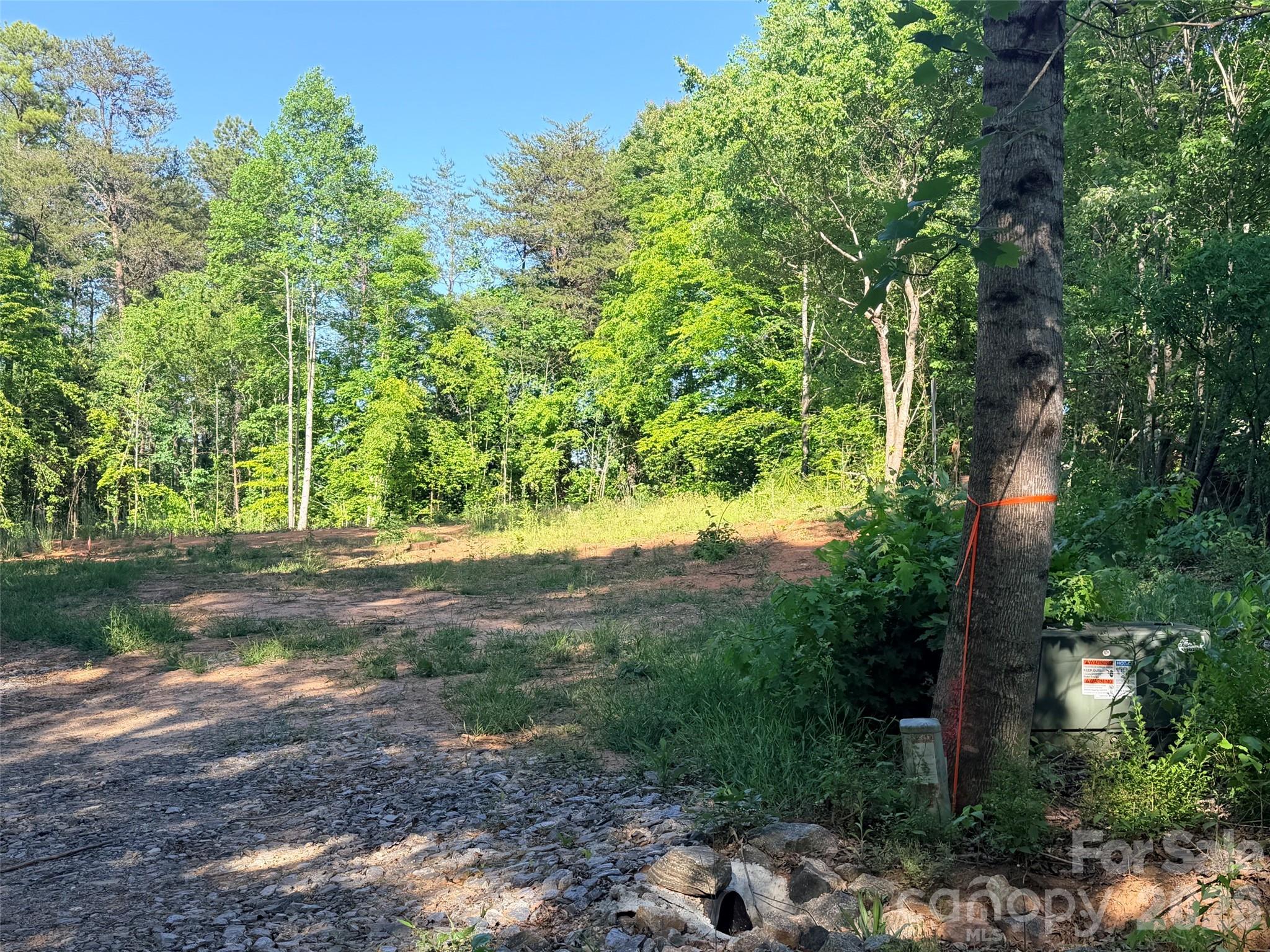 3 Lots.......3 Acres with level building site and 2 bedroom septic system already installed. Double-wides welcomed. NO single-wides. Located just off 221 & Hudlow Road in Union Mills area. Great opportunity at $56,000.