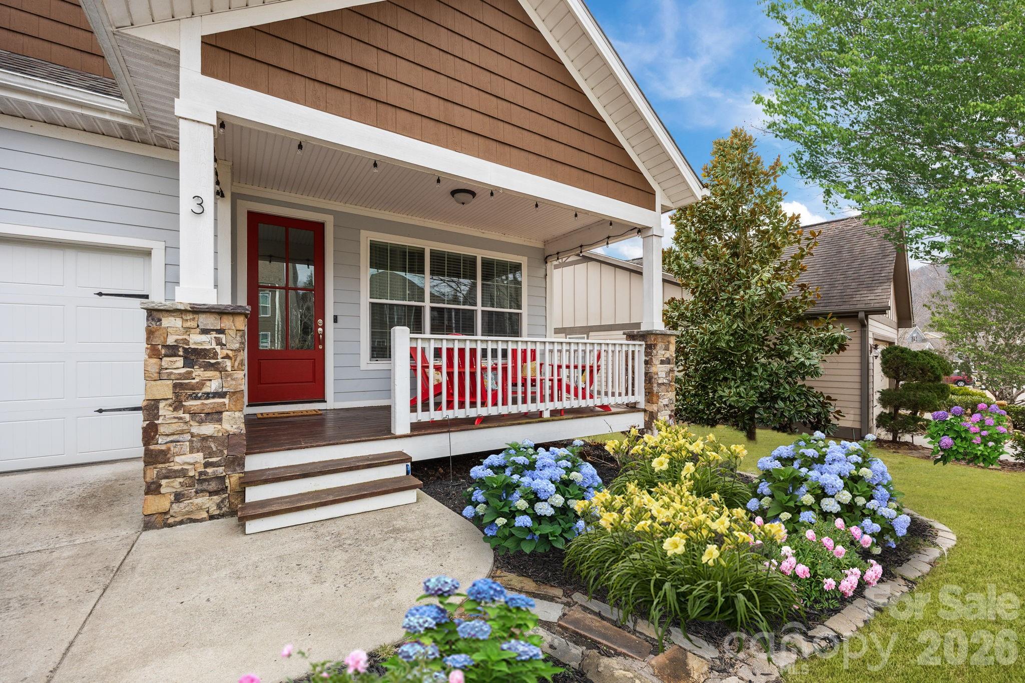 This beautiful 3-bedroom, 2-bath contemporary home offers stunning year-round mountain views and timeless charm. Only 20 mins from downtown Asheville. HOA Fee: $350/month covers lawn care services, private community well & waste water treatment plant, and upkeep for community amenities including a pool & jacuzzi, clubhouse, fitness center, community garden, and walking trails. Experience resort-style living in a gated community with stunning mountain views. Enjoy a sparkling swimming pool, clubhouse/lodge, picnic area, and scenic walking and hiking trails. Stay active in the fitness center and exercise room, then unwind in peaceful surroundings. Broadband internet provides convenience for work or streaming. A perfect blend of recreation, relaxation, and everyday entertainment.  Inside, the open kitchen and living room create a warm, welcoming space centered around a gas fireplace, perfect for cozy evenings and entertaining. Natural light fills the home, highlighting its comfortable layout and thoughtful design. The spacious primary suite features a private bath, while two additional bedrooms provide flexibility for family, guests, or a home office. Enjoy outdoor living from both the front porch and back porch, ideal for morning coffee, relaxing afternoons, or taking in peaceful mountain sunsets. Blending classic style with everyday modern comfort, this home offers a serene setting and scenic beauty in every season—an ideal mountain retreat or full-time residence.