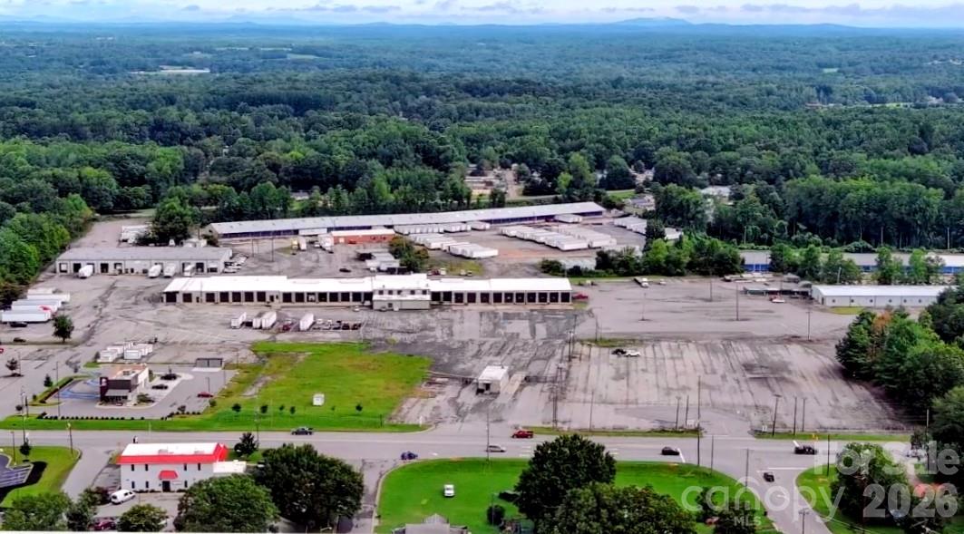 Rare opportunity to acquire a 72.61± acre industrial property in Cherryville, North Carolina. This expansive site offers exceptional operational capacity with seven industrial buildings, multiple service and loading bays, extensive outdoor storage areas, and abundant parking opportunities to maximize space.

The property is well-suited for manufacturing, logistics, distribution, heavy equipment operations, industrial services, and a variety of other industrial uses. Existing infrastructure supports heavy industrial operations while providing significant opportunity for future expansion or redevelopment.

Property Features:
• 72.61± acres
• Seven industrial buildings
• Multiple service, loading, and equipment-access bays
• Break bulk area for storage, maintenance, repair, or specialized operations
• Extensive outdoor storage and vehicle parking
• Infrastructure designed for industrial-scale operations
• Private, controlled-access setting
• Ample room for expansion and additional development

Location Highlights:
• Access to workforce throughout surrounding counties
• Strategic combination of acreage, privacy, and operational flexibility

Investment Opportunity:
This versatile industrial property presents an exceptional opportunity for owner-users, investors, or redevelopment projects. The combination of scale, infrastructure, and development potential makes it a unique offering in the market.

Contact listing agents for additional information or to schedule a private tour.