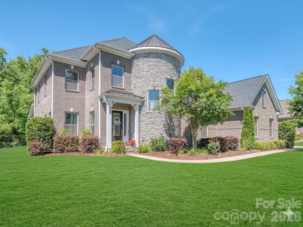 Best priced home and an amazing value in Weddington! This gorgeous home is priced under market and positioned to sell quickly. Welcome to the luxury community of The Falls at Weddington.  Ideally located just minutes from Waverly’s premier shopping, dining, and everyday needs.  This large community offers social events, neighborhood get-togethers and tons of activities designed to meet your neighbors. Conveniently located in the heart of Weddington just minutes from some of the state’s highest ranked schools.  This meticulously maintained home offers everything you are looking for with today’s modern comforts.  This well thought out floorplan is perfectly suited for multi-generational living with room for everyone.  The main level features an upgraded primary suite with dual walk-in closets and a spa inspired bath with raised height his and her vanities and an expansive walk-in shower.  The main floor flex room provides an ideal office or craft space, while the designer chef’s kitchen impresses with a massive center island, bar seating, gas cooktop, wall ovens, sealed granite countertops, a striking herringbone tile backsplash, and a generous 14' x 4' walk in pantry.  Living room showcases a gas fireplace framed by custom built ins and flows seamlessly into the dining area, creating an inviting environment for everyday living and entertaining.  A well-appointed laundry room with storage and utility sink adds added convenience.  Screened porch overlooks your private, fenced yard and patio, offering a serene outdoor retreat to enjoy the outside year-round. If you have been thinking about a pool the lot is perfectly situated to add one. Upstairs, an oversized bonus room with a walk-in closet anchors the second floor, surrounded by thoughtfully designed bedrooms. Bedrooms two and three share a true Jack and Jill bath, each with its own walk-in closet, while bedrooms four and five each feature private en suites with walk in closets. A secondary laundry room enhances the home’s efficient livability. Throughout the home, multiple tray ceilings and an extensive trim and molding package elevate the overall luxury aesthetic. The home also boasts an impressive 1,000+ sq ft three bay garages with an additional tandem bay for a functioning 4 car garage space.  The tankless water heater, and spray foam insulation delivering superior energy efficiency.  Custom drop zone and large entry closet greet you as you enter the home. Beautiful landscaping with irrigation surrounds the exterior of your home, which backs to community space—offering one of the most desirable and private lots in the neighborhood. Residents enjoy resort style amenities including a pool, fitness center, playground and trails.  This home has been lovingly maintained and is truly move in ready, offering luxury, comfort, and exceptional craftsmanship at every turn.  Call anytime for questions or your private tour!