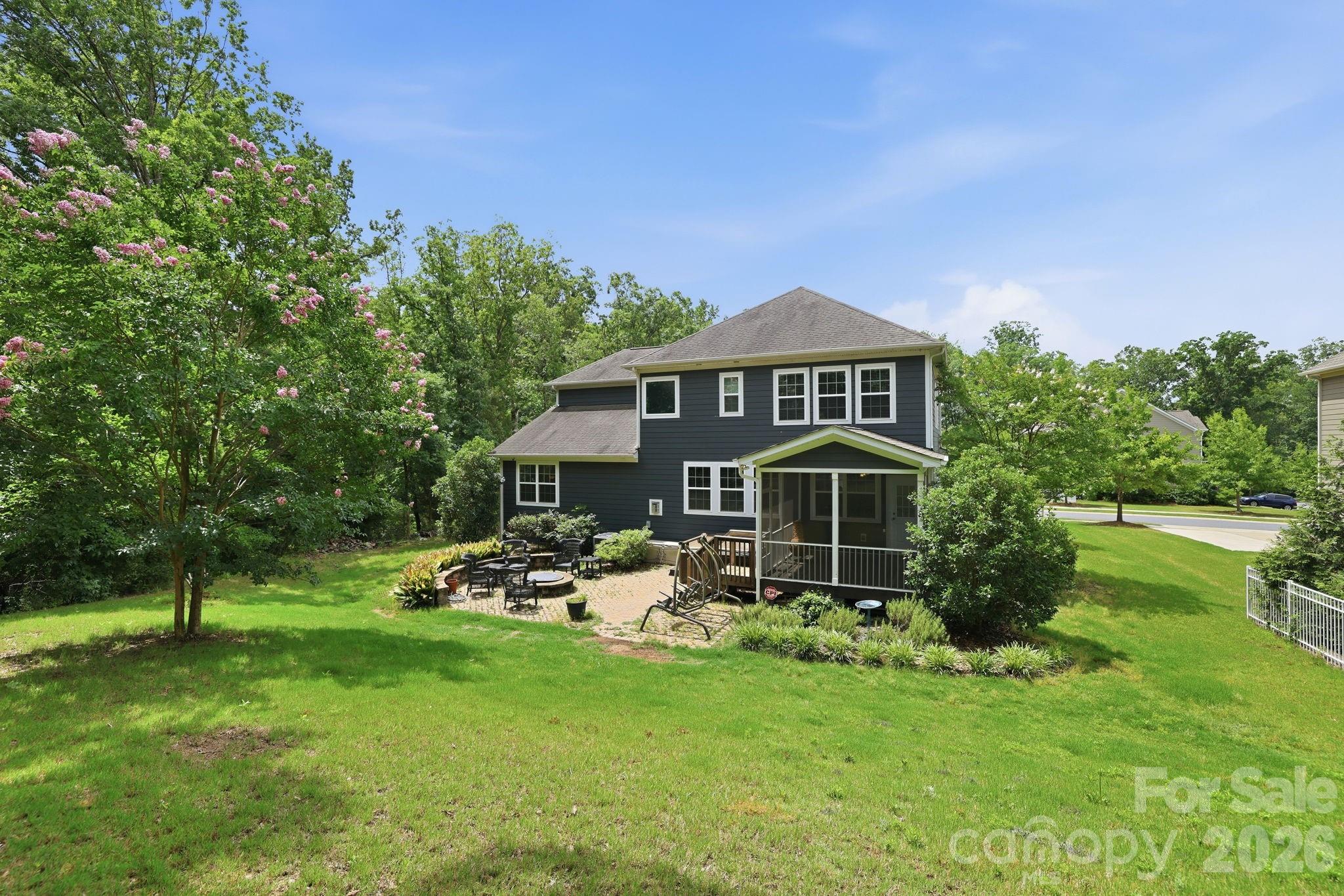 Beautifully designed 5 bedroom, 3.5 bath home tucked away on a quiet cul-de-sac in sought-after Waxhaw, NC. This desirable floor plan offers the flexibility today’s buyers are searching for, including a guest bedroom and full bath on the main level that works well for visitors, multigenerational living, or a private home office setup. Spacious living areas flow seamlessly for everyday living and entertaining, while the screened porch, sandstone paver patio, firepit, and hot tub create the perfect place to relax and unwind year-round. Thoughtful outdoor upgrades include wraparound landscaping, raised garden beds, irrigation covering the entire yard, storage shed, and Invisible Fence 360 wiring surrounding the backyard, both sides of the home, and part of the front yard for convenient pet containment.

Inside, the home features numerous updates including new luxury vinyl plank flooring installed in 2026, a tankless water heater, new AC unit in 2024 with app-controlled thermostat, app-controlled garage door openers, fresh interior paint in select rooms, built-in office shelving, custom pantry organization, and built-in shelving and drawers in the primary closet. The garage loft storage nearly doubles storage capacity, while the extended driveway provides additional parking for guests and everyday convenience.

Upstairs, the expansive primary suite provides a private retreat along with generously sized secondary bedrooms and versatile bonus space. Enjoy added privacy with no neighbors on two sides of the property and direct proximity to the nearby school campus and frisbee golf course. Residents also enjoy access to the neighborhood pool in this section of the community, along with two additional pools across the street, clubhouse, sport courts, playground, and more.

Convenient access to Historic Downtown Waxhaw, Ballantyne, Waverly, Rea Farms, I-485, and major commuter routes makes it easy to enjoy everything South Charlotte and Union County have to offer. Located near highly rated schools, shopping, dining, parks, and recreation, this move-in ready Waxhaw home combines comfort, functionality, and location in one exceptional opportunity.