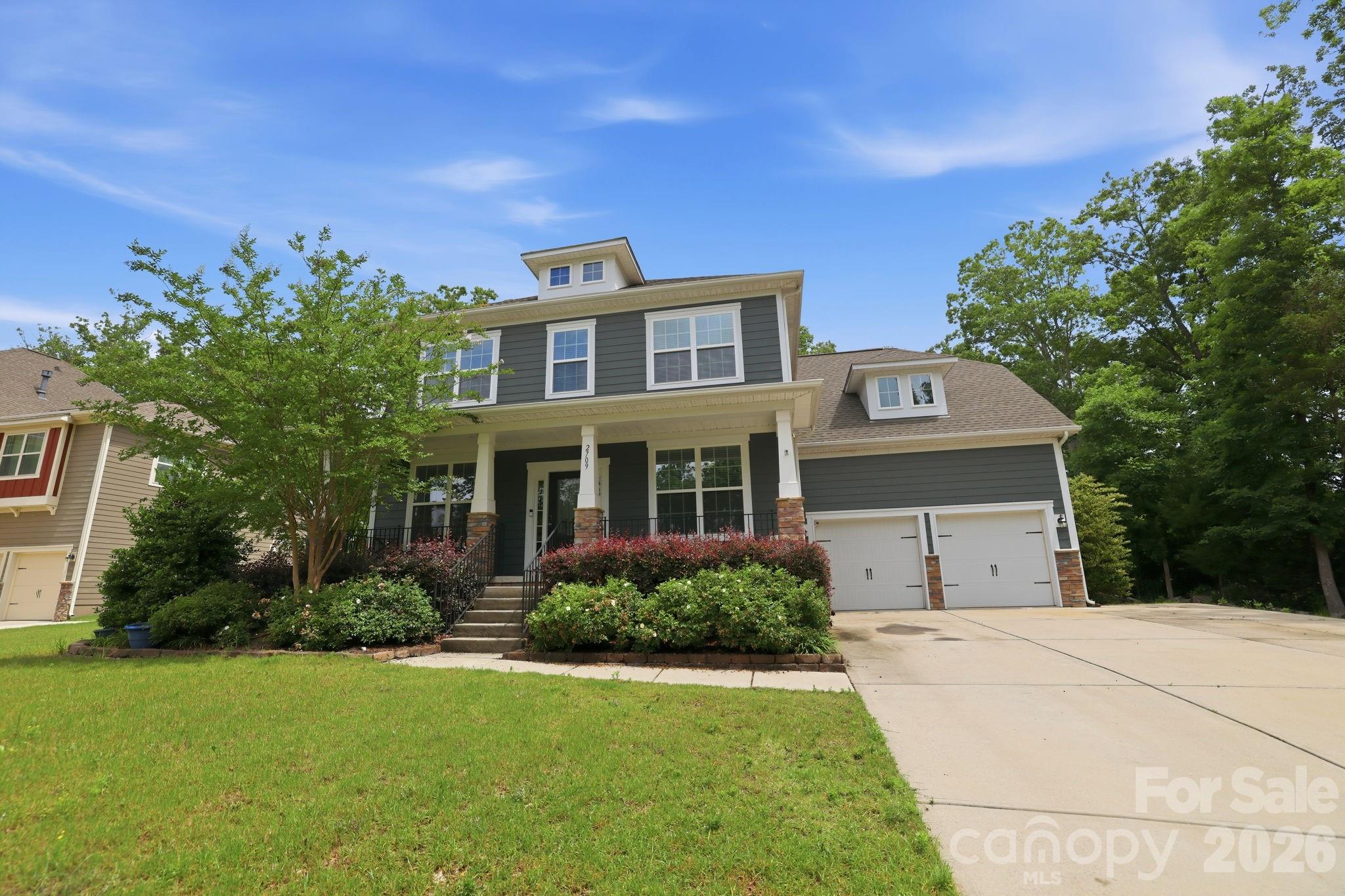 Beautifully designed 5 bedroom, 3.5 bath home tucked away on a quiet cul-de-sac in sought-after Waxhaw, NC. This desirable floor plan offers the flexibility today’s buyers are searching for, including a guest bedroom and full bath on the main level that works well for visitors, multigenerational living, or a private home office setup. Spacious living areas flow seamlessly for everyday living and entertaining, while the screened porch, sandstone paver patio, firepit, and hot tub create the perfect place to relax and unwind year-round. Thoughtful outdoor upgrades include wraparound landscaping, raised garden beds, irrigation covering the entire yard, storage shed, and Invisible Fence 360 wiring surrounding the backyard, both sides of the home, and part of the front yard for convenient pet containment.

Inside, the home features numerous updates including new luxury vinyl plank flooring installed in 2026, a tankless water heater, new AC unit in 2024 with app-controlled thermostat, app-controlled garage door openers, fresh interior paint in select rooms, built-in office shelving, custom pantry organization, and built-in shelving and drawers in the primary closet. The garage loft storage nearly doubles storage capacity, while the extended driveway provides additional parking for guests and everyday convenience.

Upstairs, the expansive primary suite provides a private retreat along with generously sized secondary bedrooms and versatile bonus space. Enjoy added privacy with no neighbors on two sides of the property and direct proximity to the nearby school campus and frisbee golf course. Residents also enjoy access to the neighborhood pool in this section of the community, along with two additional pools across the street, clubhouse, sport courts, playground, and more.

Convenient access to Historic Downtown Waxhaw, Ballantyne, Waverly, Rea Farms, I-485, and major commuter routes makes it easy to enjoy everything South Charlotte and Union County have to offer. Located near highly rated schools, shopping, dining, parks, and recreation, this move-in ready Waxhaw home combines comfort, functionality, and location in one exceptional opportunity.
