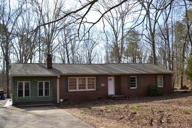 Tons of updating to this brick ranch home!  Sits on 3.39 acres.  Granite kitchen with stainless appliances and tile backsplash, sandwich bar.  Great room has fireplace.  Open floor plan.  Two full updated baths, bonus room!  Backs up to creek.  Beautiful hardwood floors.