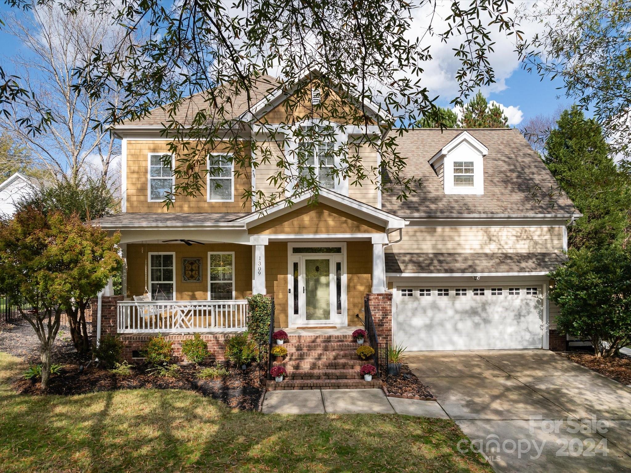 Wonderful Saussy Burbank home in Tega Cay's Lake Shore Community! This 4 bedroom, 2.5 bath beauty has been freshly painted and is move in ready! This home features a rocking chair front porch, refinished hardwoods on the first floor, kitchen area is open to living area, perfect for entertaining, formal dining room for festive occasions. All bedrooms are upstairs. The 4th bdrm could be a bonus room. The private fenced in backyard is located on a cul de sac, spend your days sunbathing by the pool in this backyard oasis. The beautifully designed gunite pool features a waterfall, custom travertine tile and lighting with a large sun shelf. Walking distance to Tega Cay Elementary. Tega Cay is a resort like community offering a golf course, beach lake access, boat launch, paddle boarding, kayaking, canoeing, bike trails, tennis courts, pickleball courts, ballfields, restaurants, a clubhouse and more. Award-winning Fort Mill schools. Just 2 hrs to the mountains, and 3 hrs to the beach!