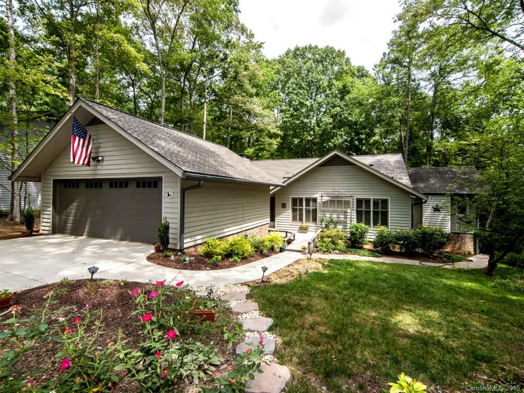 Spectacular home in River Hills located in a cul de sac with seasonal views of Lake Wylie/ 3 bedrooms on the main level including master & ensuite bath/separate shower/soaking tub.  Gourmet Thermidor kitchen opens to keeping room. 4 gas fireplaces. Downstairs bedroom, wine cellar, sauna and workout room. Walk up attic. Multigenerational potential/ separate entrance to lower level rooms.  New decking/gas fire pit. Open concept home perfect for entertaining. Hardwoods on most of main level. WOW!