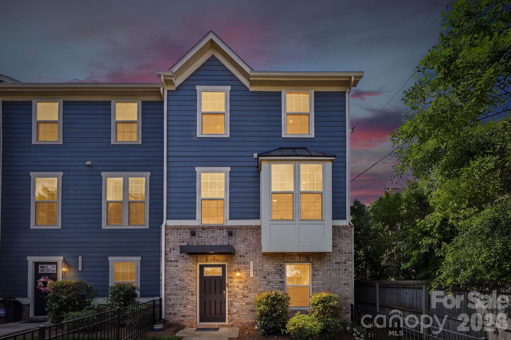 Welcome to Morningside Mews! Tucked in the vibrant heart of Plaza Midwood’s historic arts and business district, and now Charlotte’s first social district—where walkability meets vibrant community living, this stunning townhome is a true gem of modern design surrounded by timeless charm. Built in 2018, it offers the best of both worlds: an unbeatable location with exceptional walkability to trendy shops, buzzing nightlife, and cozy coffee spots, all while being just moments from the peaceful greenery of Veterans Park. Inside, you'll be greeted by a perfect blend of style and sophistication. This immaculately cared for 3-bedroom, 2 full 2 half-bathroom residence boasts gleaming hardwood floors, sleek recessed lighting, and spacious walk-in closets. The attached 2-car garage adds a layer of convenience rarely found in urban living. Located just minutes from uptown Charlotte, this home strikes the ideal balance between city accessibility and private retreat. Whether you’re relaxing in your serene sanctuary or stepping out to enjoy the dynamic neighborhood, this move-in-ready townhome checks every box for the ultimate urban lifestyle.
