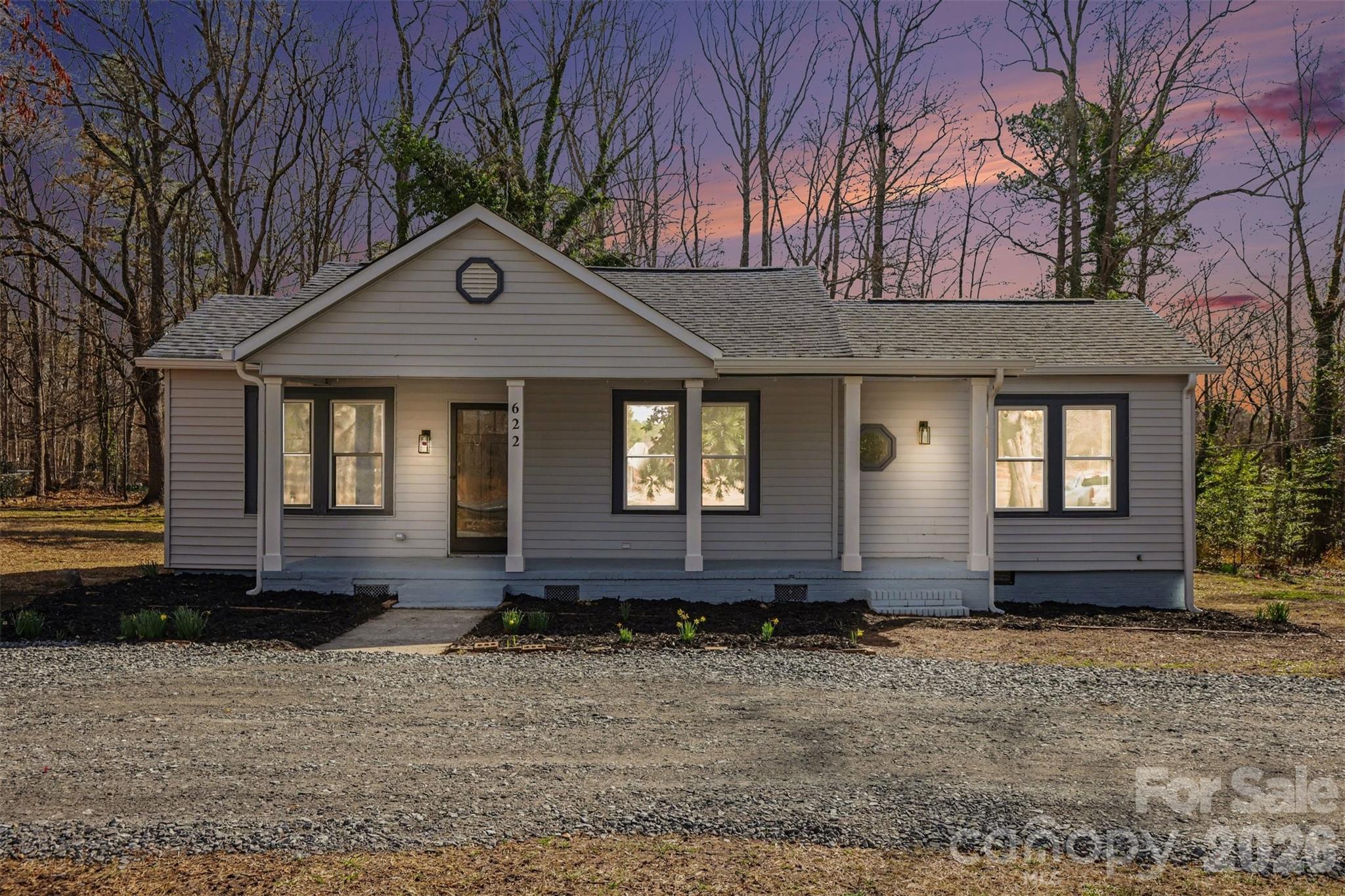 So much larger inside than it looks from the outside! 2.93 acres of country living in an adorable newly renovated home! This wonderful renovation gives you a like new home with plenty of outside land to build a workshop, add a pool, add on to the house or anything you want to do since there is NO HOA. Park your work trucks and motor homes that HOAs won't allow. The half circle driveway gives you plenty of parking space for guests. This home is so cute inside with all its interior renovations. There is new electrical and plumbing, new water heater, new crawlspace insulation and vapor barrier, Quartzite counters in kitchen and baths, marble shower surrounds in the bathrooms, new flooring, new lights and cabinets throughout the house of course. On the outside, there are new 6 inch seamless gutters and new decking and new supports on the back deck There is a new well bladder, new pump and filter system. Check out the added touches like the tongue and groove kitchen ceiling, Beadboard ceilings in both bathrooms and shiplap ceiling in the breakfast nook. Custom wood shelving in the kitchen, pantry and custom stained columns for a touch of class.  The step-down breakfast bar area is great for visiting with family or friends while you cook. There is room for your plants that need lots of light as well from the breakfast area and multiple canned lights.  There is a large great room with an electric fireplace, which opens to the spacious dining room with enough room for a China hutch, you don't find that often in the newer homes.  A spacious new kitchen with a stand-up pantry, all new appliances, and a breakfast bar, and all new cabinetry. There is 6 inch crown molding and 8-inch baseboard throughout. A new utility room features a built-in coat cubby and the washer and dryer hook ups. Primary bedroom features a large walk-in closet and ensuite bath with comfort height fixtures and farmhouse sinks. 2nd and 3rd bedrooms are spacious and have easy access to the large hall bath.  There is an old carport to the right of the property for now but seller may remove it with an acceptable offer. This home welcomes you with a huge rocking chair front porch and enjoy the evenings or outside entertaining on the large, elevated deck. Come and take a peek!  Agent has ownership interest,