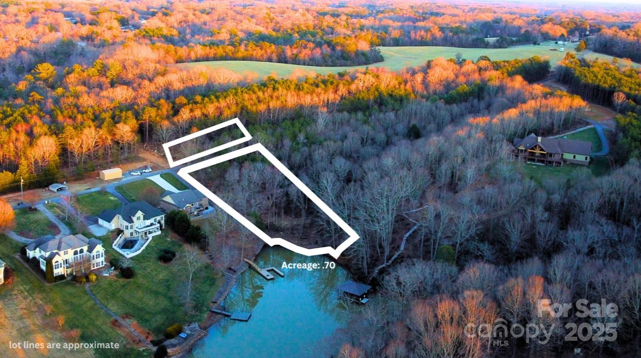 This lake lot could be yours for just $120k! Located down the quiet street of Huntington Ln in Conover you will find this property at the back of a private cove on the beautiful Lake Hickory. This property has NO HOA, has already been forestry mulched, and has had a recent perc test that passed with flying colors. It’s ready to build your dream lake house! Square Footage Restrictions are 1800 for one story, 2400 for two story.