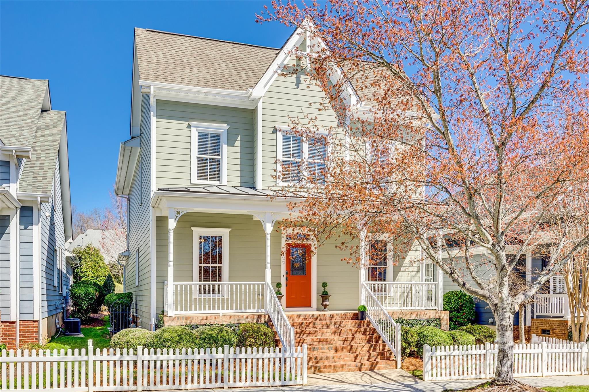 ***$27k Price Reduction makes this the BEST value in Baxter Village! This pristine gem is nestled in the coveted Garden District! Enjoy a low maintenance lifestyle w/included lawn maintenance + prime location where you can walk to Orchard Park Elementary, Baxter Towne Center, Baxter Community Center + more! Charming front porch overlooks pocket park w/expansive lawn. Interior features hardwood floors (*ask about cost to add more hardwoods), newer carpet + fresh neutral paint. Spacious kitchen w/painted white cabinets, abundant counter space + newer stainless appliances. This floor plan gives you so many possibilities w/Office & Sunroom on main level + oversized Loft area upstairs for total flexibility depending on how you live. Primary bath completely renovated w/custom cabinetry, granite counters + custom tile shower w/frameless glass. Updated secondary bath w/new vanity + tile floors. Rear load 2 car garage + driveway for additional parking. Quaint patio area w/hedge for privacy.