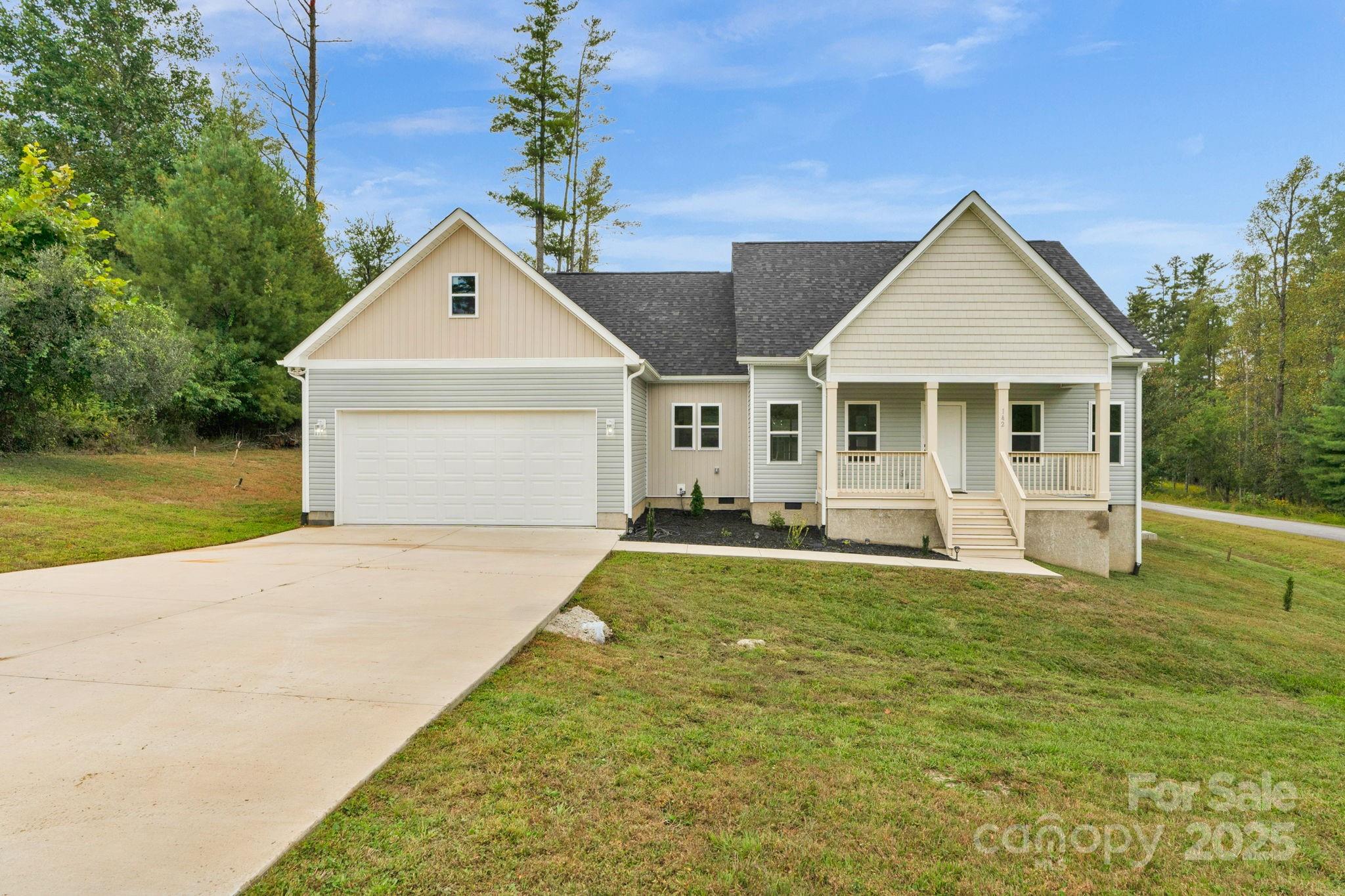 *** PRICE CORRECTION*** Brand New Home, never been lived in.  Nestled in the Mountains just outside of Hendersonville, NC.  Incredible neighborhood of Crystal Creek with unmatched natural surroundings.  This 3-bed 2-bath gorgeous home on an amazing lot is within walking distance to the neighborhood lake.  A small stream meanders through the lower part of the neighborhood, taking the charm of the home over the top. Modern Open Floor plan of this 1-story Craftsman Style home.  Wide Open living area with a large kitchen island for food prep or Family Breakfast.  Home is made for large family gatherings and privacy with a split bedroom plan. Kitchen has granite, stainless and white shaker cabinets with soft-close doors and drawers.  An amazing backsplash adds that pop to an already great kitchen.  Large primary bedroom with ensuite bath and walk-in closet.  Beautiful 2nd bath and 2 other generously sized bedrooms.  Covered front and back porch, depending on where you want to sit your rocking chair to admire the views. The lawn has grown in nicely.  The home is a 10-minute commute to downtown Historic Hendersonville.  Short commute to the Asheville Airport.  Perfect combination of privacy and access to the modern world.  Come see this property soon.