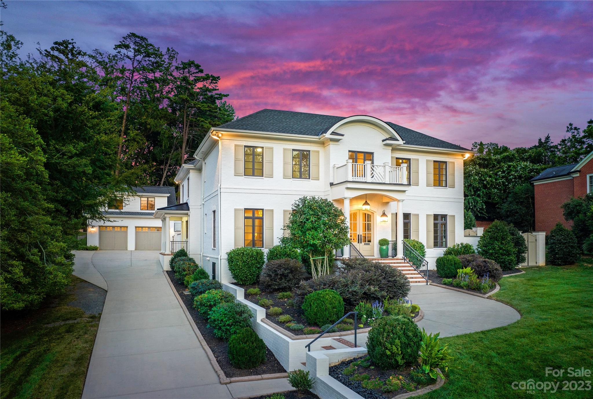 Stately, Transitional Myers Park home situated on a large lot. Highly desirable painted brick with lush landscaped lot. Main level features a foyer, formal living room, formal dining room, & butler's pantry area. Open floor plan, with large kitchen, Subzero and Wolf appliances, large island, pantry, mud room, and breakfast area. Great room with built-in's and fireplace. Study with tons of windows and custom built-in's. Upper level features the large primary suite with ensuite bathroom, two walk-in closets. Four additional guest bedrooms & 3 baths, playroom & laundry room. Covered patio offers a fireplace. Large modern style pool with hot tub and water features. Newly built pool house with full bathroom, laundry & outdoor patio with fireplace. 2-car detached garage with guest apartment, kitchenette, laundry & full bathroom. Newly built sport court can act as a basketball court, pickleball court, volley ball & tennis court. Loaded with custom features. Conveniently located to everything!