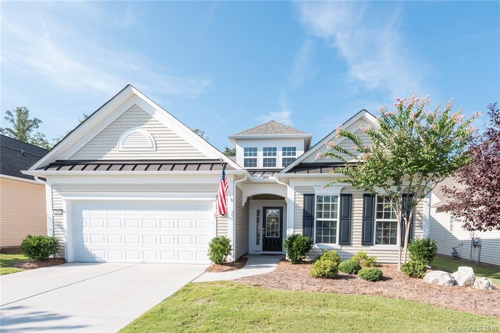 Lovely Vernon Hill model on a private wooded lot. Enjoy beautiful views from the sunroom or extended paver patio that includes lighting, sitting wall, & full irrigation. The interior has many appealing features: hardwood floors throughout, ceramic tile in the foyer, sun room & bathrooms, wainscoting in the dining room, crown molding, & a gas fireplace. Highlights of the kitchen include its granite counters, under cabinet lighting, tile backslash, & SS appliances. 55+ Active Adult Community.