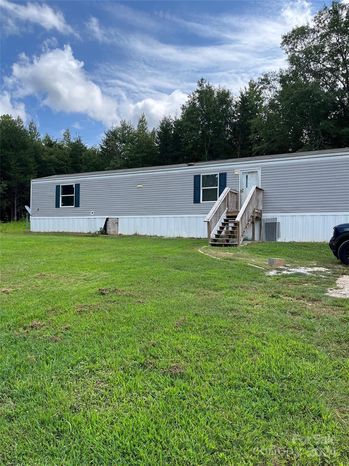 Tremendous mobile home park with newer homes and large yards for each home. This is a cash cow for the future. 2 Year old manufactured home park! Come live in Shamrock park where you will be in a serene wooded nook of Landrum, SC. Many homes have a modern open floor plan with 3 bedrooms and two bathrooms. Throughout your home is beautiful plank flooring, all appliances and central air. Property management firm in place already. There are 12 mobile homes. Most are from 2020 and a couple 2022 and 2021.  They are all 3 bedrooms from Clayton and the model is Glory  14 x 76'. All the titles convey. Great opportunity to get a nice park with newer homes.