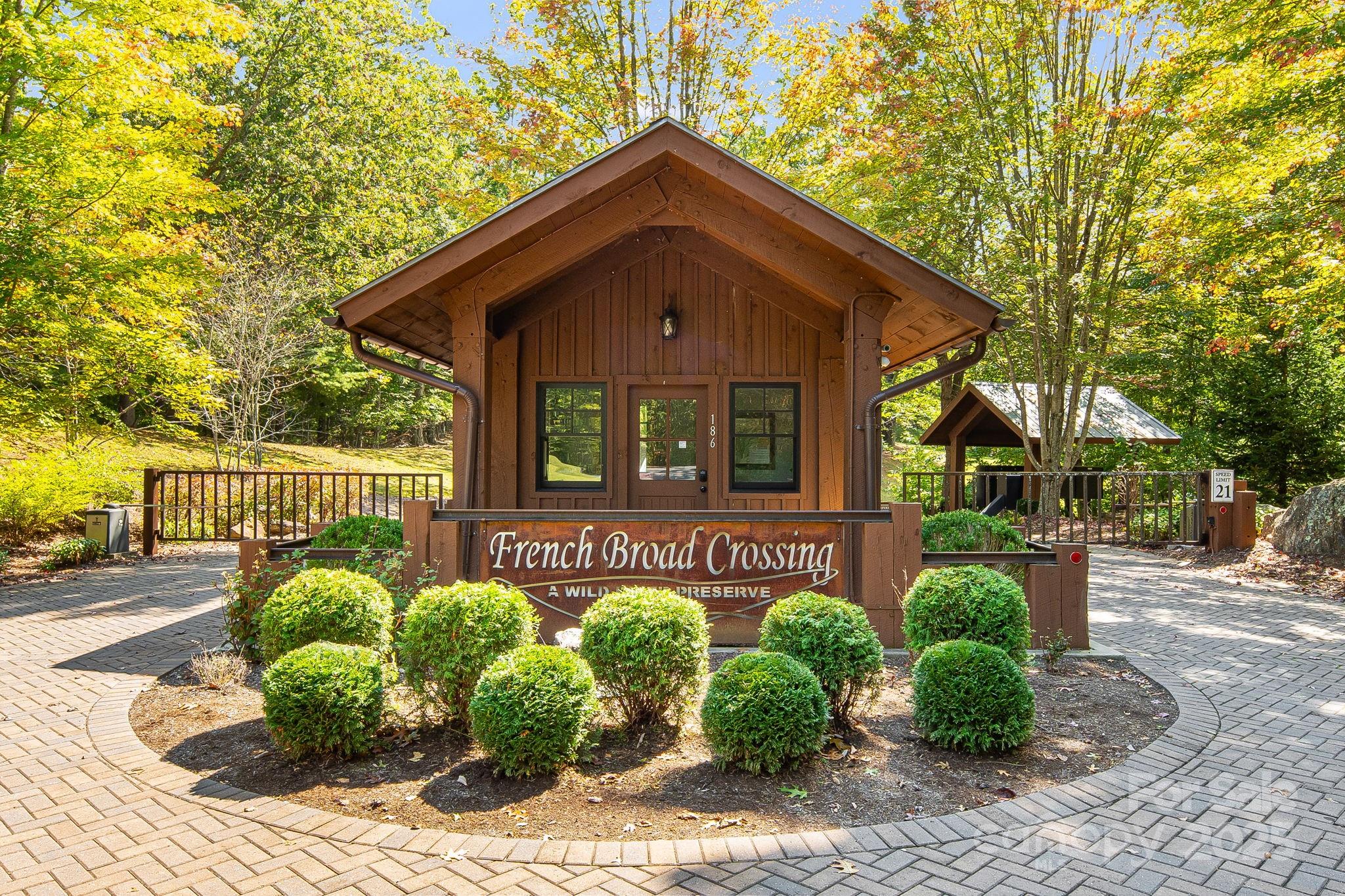 Discover the perfect setting for your mountain dream home on this 3.24-acre homesite in beautiful Madison County. Tucked away for peace and privacy yet part of an established community, this property offers the best of both worlds—natural beauty and modern convenience. Enjoy wooded surroundings with sweeping views of the mountains and river below. Whether you’re envisioning a full-time residence or a serene second home, this lot provides an ideal canvas for your vision. The property sits within a private, amenity-filled community featuring a lodge, gym, river park, hiking trails throughout the community, pool, and hot tub—perfect for relaxing or entertaining with family and friends. Power is available nearby, and the area supports private well and septic systems. Easy access to nearby outdoor recreation, charming small towns, and all that Western North Carolina has to offer makes this an outstanding opportunity to create your mountain retreat.