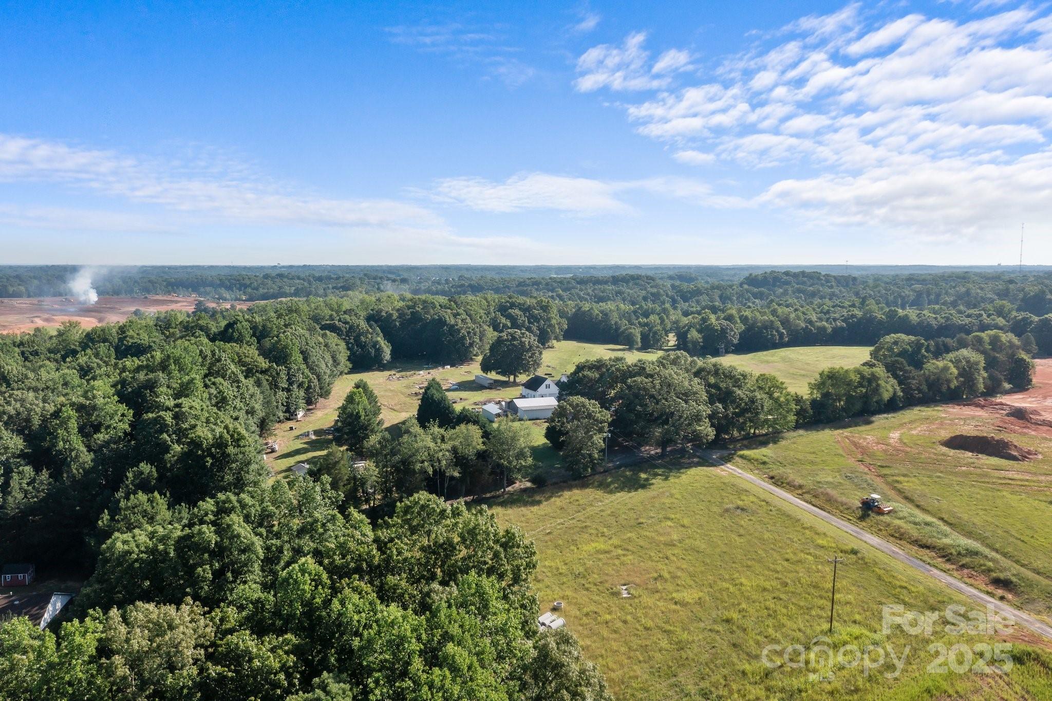 Great opportunity acreage for development!Property was rezoned commercial..This property offers 42+- acres.Located just outside the town of Troutman right behind the concrete plant off Murdock road. This property offers easy access to I-77 and is very close to major commercial growth. There are two homes and numerous barns/buildings on the property that will convey at no value.