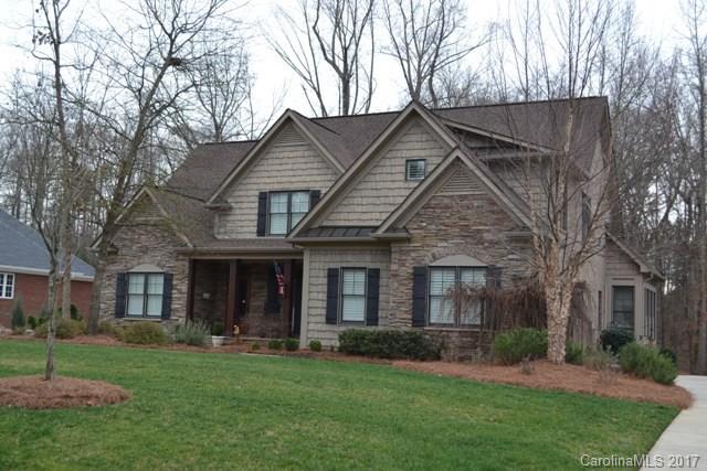 Full of southern charm! Tons of living space and storage! Formal dining room, granite kitchen with stainless appliances, two-story great room with fireplace/gas logs.  Huge master suite on main level with spa like bath. Upstairs houses 3BR, 2BA and office space. Lower level has a beautiful rec room with fireplace/gas logs and a wet bar, den, bedroom and full bath. The lot directly behind home is included in price-tax map #5850000203. Plantation shutters throughout, irrigation system. A must see!