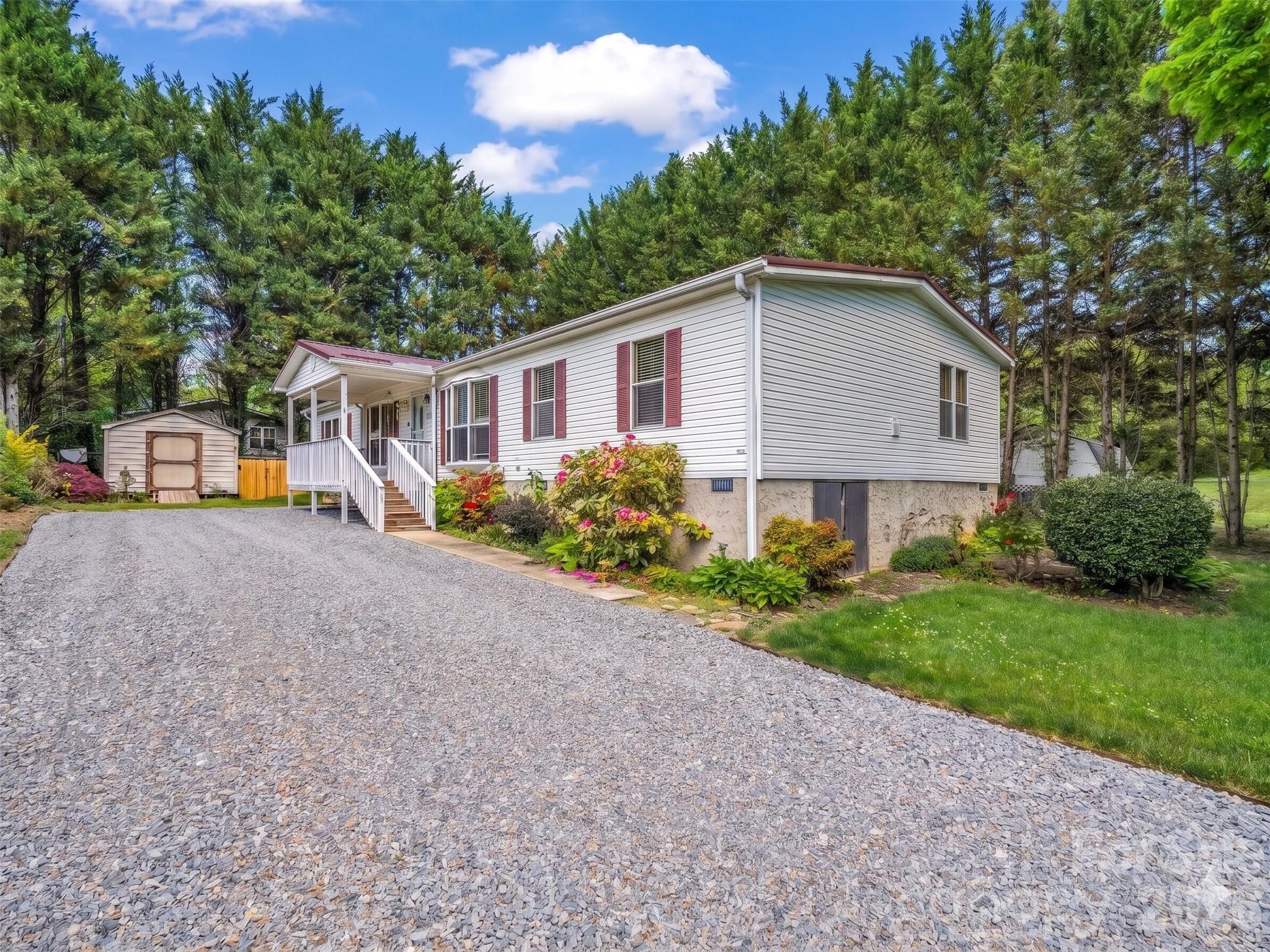 Located in the heart of Black Mountain, NC, 213 Old State Ten Road offers a rare opportunity for affordable homeownership in a highly desirable mountain community. This prime location is less than a mile from downtown, and just over a half mile from Black Mountain Elementary and Primary Schools. At 1,805 square feet, this property is impressively large for a manufactured home, providing a level of space and comfort often reserved for traditional site-built residences. The open floor plan is designed for modern living, featuring multiple living spaces that offer flexibility for a home office, media room, or play area.

A standout feature of this property is its exceptional value. Priced at an attractive $193 per square foot, it represents a budget-friendly alternative to the rising home costs in Buncombe County. For those looking for an investment, the home offers significant rental potential, catering to the strong demand for housing in the Asheville region.

The exterior is just as functional as the interior. Situated at the end of a cul-de-sac, you will enjoy a level of privacy that is hard to find. The home sits on a rare flat yard with a fenced yard, making it perfect for pets or gardening. Low-maintenance materials ensure you spend more time enjoying the mountains and less time on upkeep, and the included storage shed provides plenty of room for tools and outdoor gear.

Whether you are a first-time buyer seeking affordability or an investor looking for a high-potential rental, this spacious and well-located home is a must-see in one of Western North Carolina's most sought-after towns.