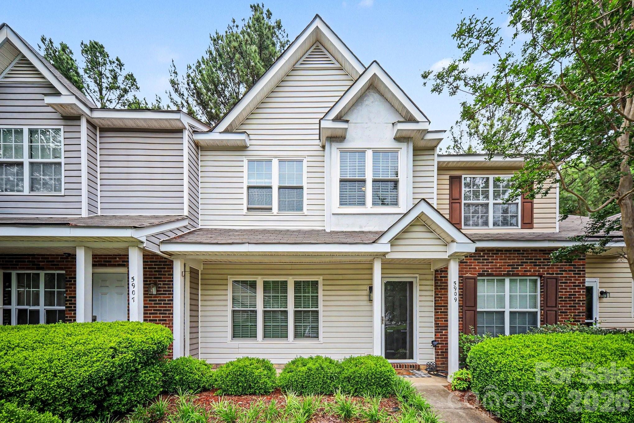 This turn-key townhome features a complete interior refresh, including designer light fixtures, fresh neutral paint, and premium updated flooring throughout. The heart of the home is the remodeled kitchen, complete with upgraded countertops, a stylish backsplash, and stainless steel appliances. Bathrooms have been tastefully updated, and the primary suite offers ample storage with ample walk-in closets.

Step outside to your private oasis: a fenced patio with stone pavers, ideal for weekend entertaining.