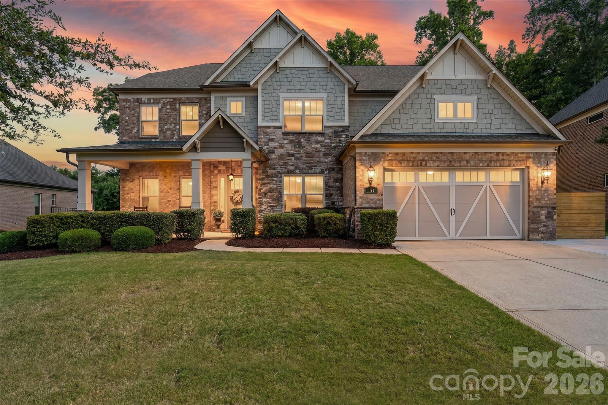 Welcome to 156 Reserve Lane, where space and luxurious finishes blend seamlessly!    Immediately upon walking into this home, you experience the quality details of the extensive molding and upgraded lighting fixtures. The layout brings a new meaning to functional living.  Featuring 5 bedrooms, a home office, bonus room, flex or gaming area, this home has plenty of space to accommodate everyone.  An outdoor bar/grilling area with built in fridge makes for a perfect place to relax or entertain guests.  Live just minutes away from Charlotte and enjoy lower SC property taxes!