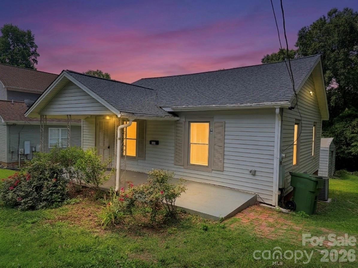 This charming single-story home in Adrian Park blends historic character with everyday comfort. Built in 1916, the residence offers 875 square feet of living space with two bedrooms and one full bath, all thoughtfully arranged on one level. A welcoming front porch sets the tone, providing the perfect spot to relax and enjoy the neighborhood setting.

Inside, you’ll find a cozy living room featuring a fireplace that adds vintage charm and architectural interest. The home showcases a mix of warm wood flooring and carpet, creating an inviting atmosphere throughout.
The kitchen offers ample cabinetry and counter space, with room for casual dining and easy access to the laundry area located on the main level for added convenience. The bedrooms are comfortably sized with natural light, and the full bath is centrally located for functionality.

Situated on a generous 0.26-acre lot, the property provides plenty of outdoor space for gardening, entertaining, or future possibilities. A gravel driveway offers off-street parking, and the home is connected to city water and sewer. Heating is provided by natural gas with central air conditioning for year-round comfort. With no HOA and located within the established Adrian Park community, this property presents a wonderful opportunity to own a piece of Mount Holly’s charm while enjoying convenient access to local amenities, dining, and commuter routes. **Seller offering $2500 appliance credit***