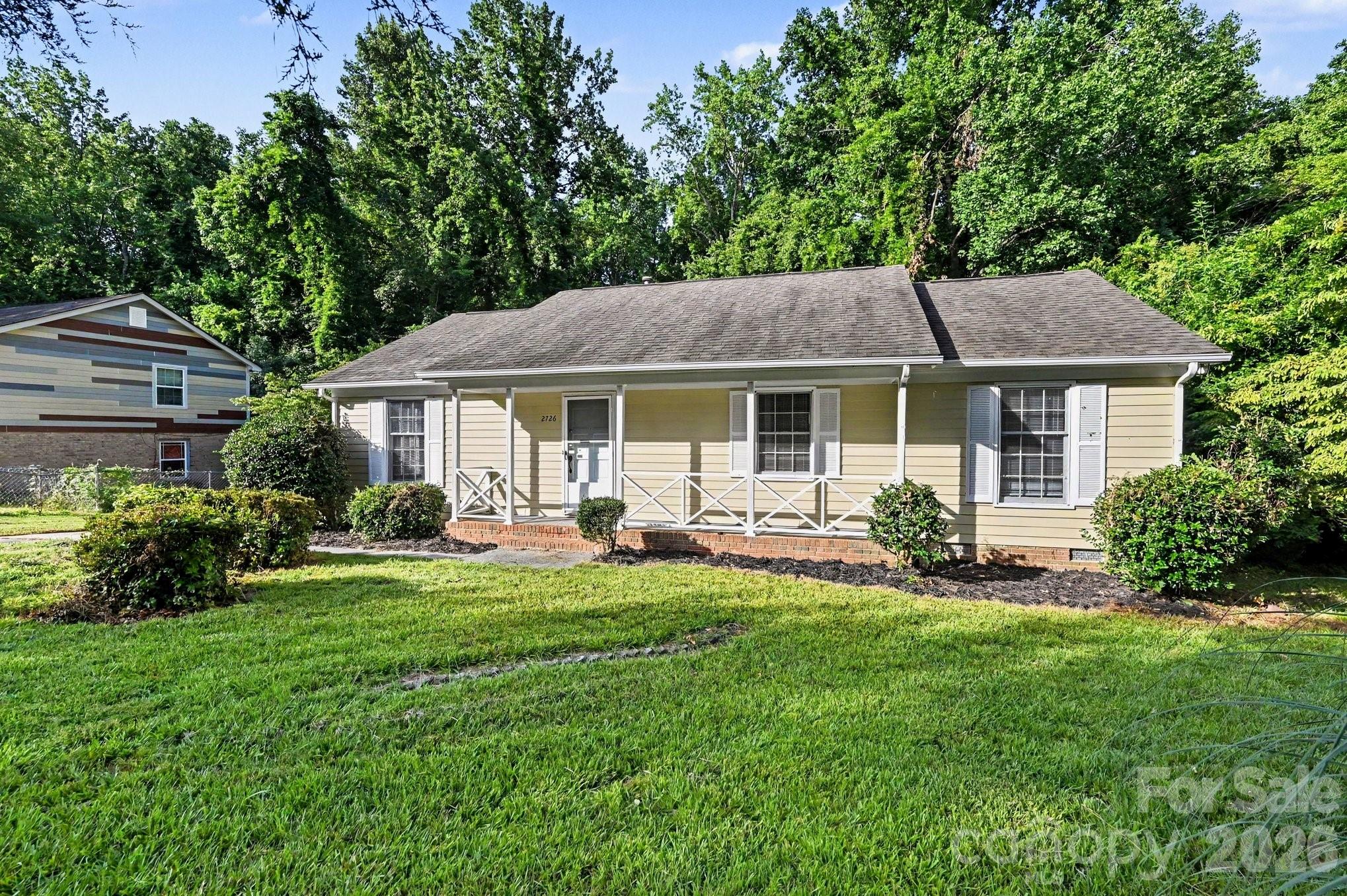 Welcome to this well-maintained 3-bedroom, 1.5-bathroom home situated in the sought-after Milton Acres neighborhood. This property features a classic traditional floor plan, providing dedicated and distinct spaces for living and dining. The updated kitchen is a true focal point, thoughtfully finished with beautiful granite countertops and modern stainless-steel appliances. Step outside to discover a fully fenced-in backyard, offering excellent privacy and a great space for outdoor relaxation or entertaining. Perfectly positioned for an easy commute and lifestyle, this home is just minutes from everyday conveniences, major employment hubs, and the premier dining, shopping, and entertainment districts of Plaza Midwood, No Da, Villa Heights, and Uptown Charlotte. Schedule your private showing today!