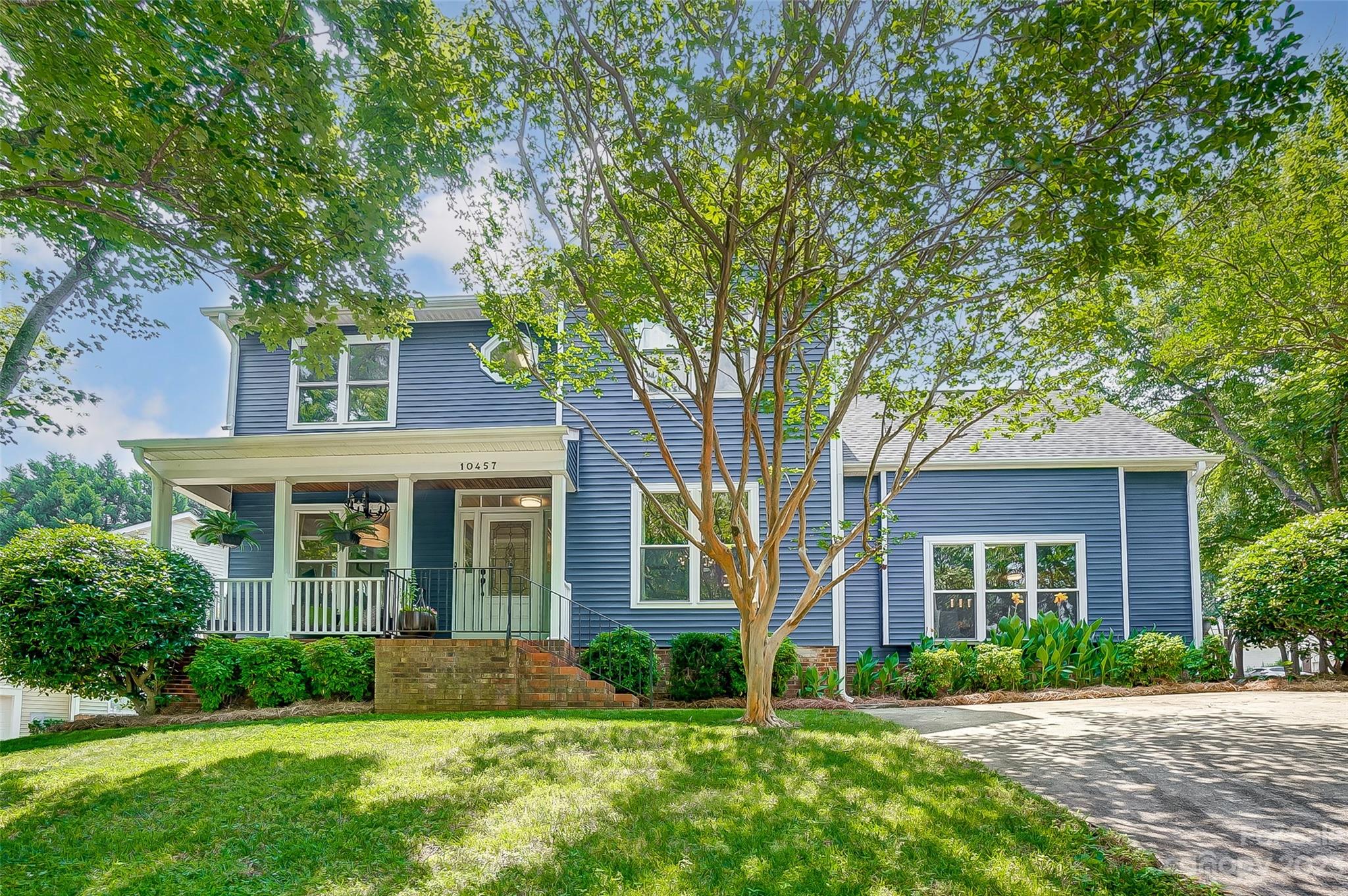 Immaculate, move-in ready home in Windward Cove, a waterfront community providing gated access to boat & kayak storage, day dock, boat launch, picnic area, & trails. This gorgeous home boasts beautiful flooring, rich molding & an open floorplan that is great for entertaining. You’ll love the spacious & light filled great room w/ fireplace opening to kitchen & sunroom, where you’ll spend hours relaxing or lingering over morning coffee. Engage your inner chef in the dream kitchen w/ ss appliances, granite counters, & dining area. The formal dining room is perfect for elegant dinner parties. Lovely primary suite w/ vaulted ceiling & spa-like bath. 2nd living quarters "Apartment" w/ private bedroom, bath, full kitchen, living room w/ fireplace, & private entrance can be closed off or left open to main house. Entertain & grill on the spacious patio w/ firepit. Enjoy lake adventures from the private lake access that is just a short walk away. Minutes from shopping, dining, I-485 & airport.