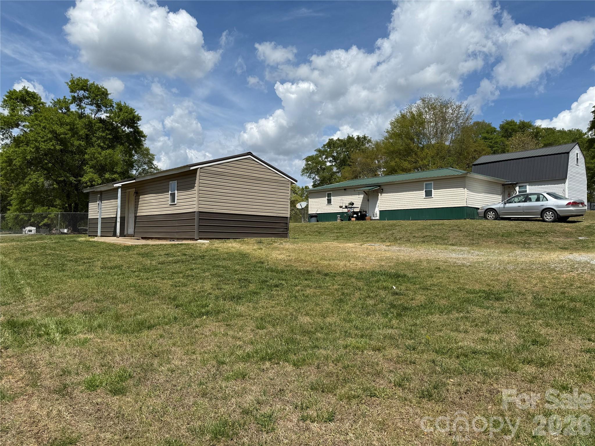 Attention Investors! Don't miss this excellent income-producing opportunity featuring four tiny homes situated on approximately .81 acres. All units are in good condition, with three homes currently rented at $800 per month and the fourth generating $1,000 per month-offering immediate cash flow. Property is connected to city water and ideally located less than 5 miles from downtown Forest City, providing covenient access to shopping,dining, and local amenities. Whether you're looking to expand your rental portfolio or to step into multi-unit investing, this property checks all the boxes!