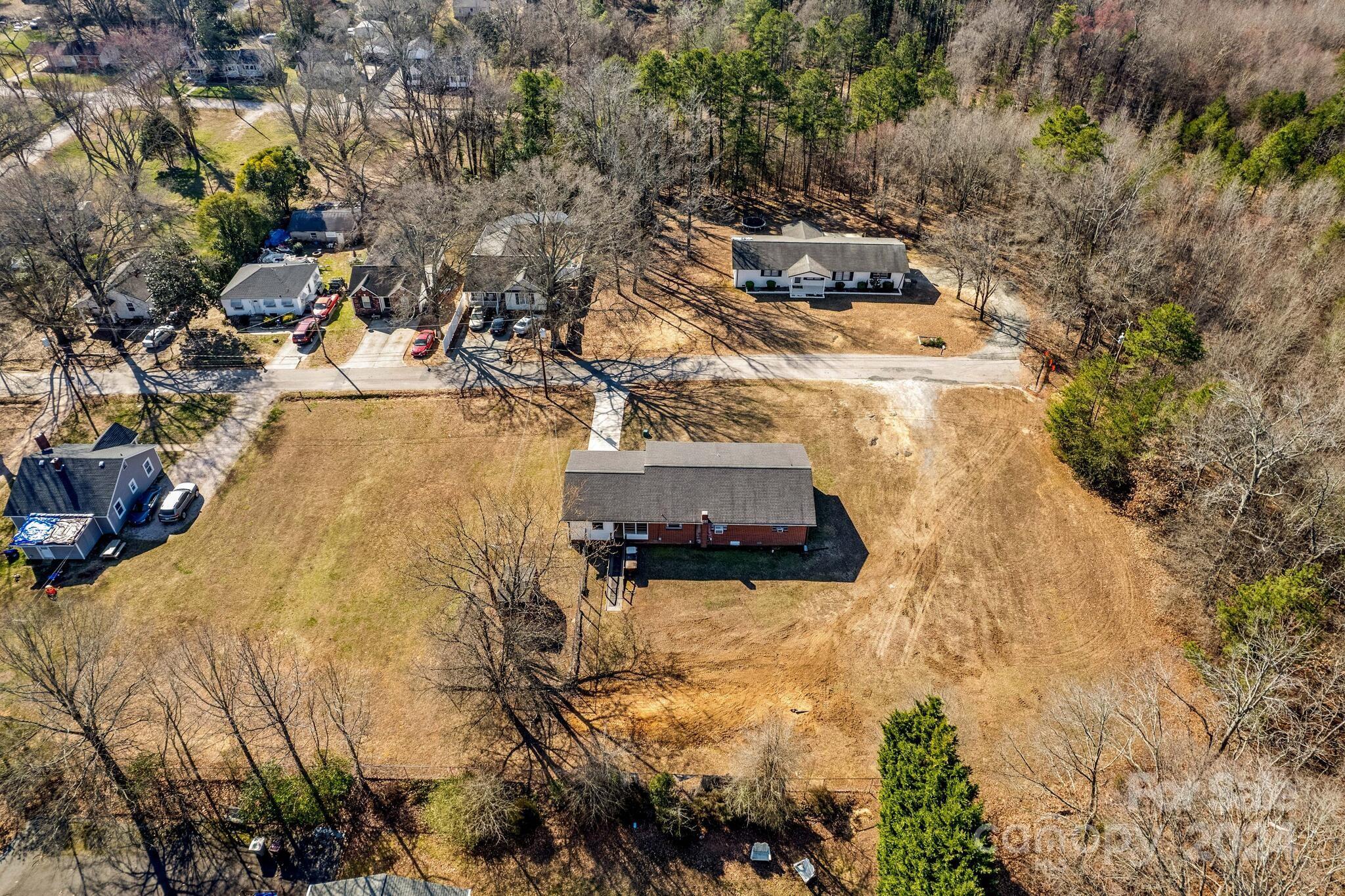 Lot divided from 208 W 19th St. Lot 3 is closest to the other house in picture.