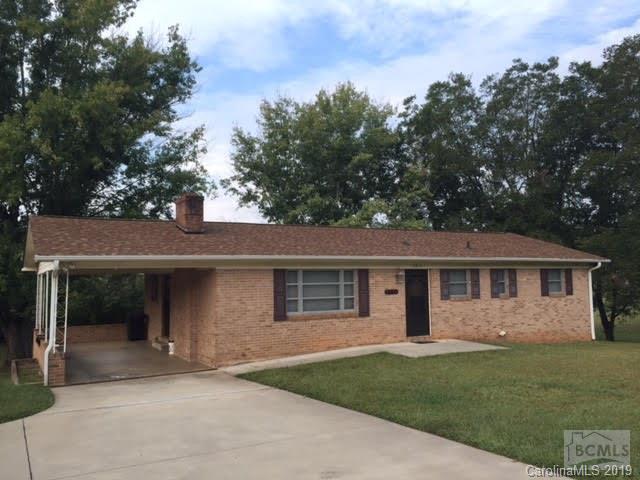 Must See!!! This recently updated brick ranch down Hwy 18 South. This 3 bedroom, 2 bath home with a full unfinished basement sits on a total of .67 of acre lot. Sellers are also selling the vacant lot next door with the home. Home consists of large living room with gas fireplace, hardwood floors, open kitchen, tile in baths, his/her sink with newly updated bathrooms and a full basement for plenty of storage. New roof in 2014!!! Home also carries a 1 year home buyer warranty!!!