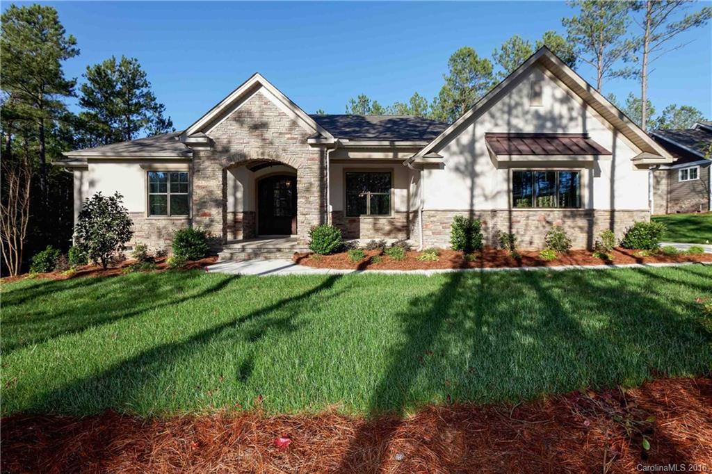 The Charles plan has everything you've been dreaming of! With this spacious ranch style home, you will be delighted with the spacious layout. Perfect for entertaining, or just enjoying your serene view of nature. The expansive covered back porch offers over 500 sqft of prime entertaining area featuring stainless stell grill and kitchen area, plus a fireplace. *Home pictured may be different. Stock Photos