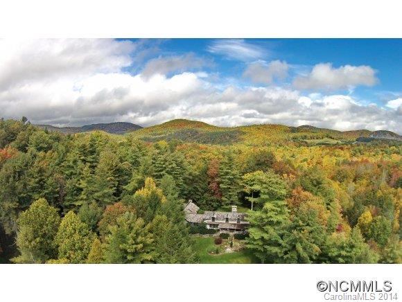 Reflections' is the epitome of a mountain estate situated at over 4,100' of elevation on 42 sprawling acres. As you pass the stone entrance pillars with gas lights, the road meanders past meadows, fenced pastures, and scenic ponds. The tastefully renovated estate features the main house, and several other structures, including the horse stables constructed in 2011.