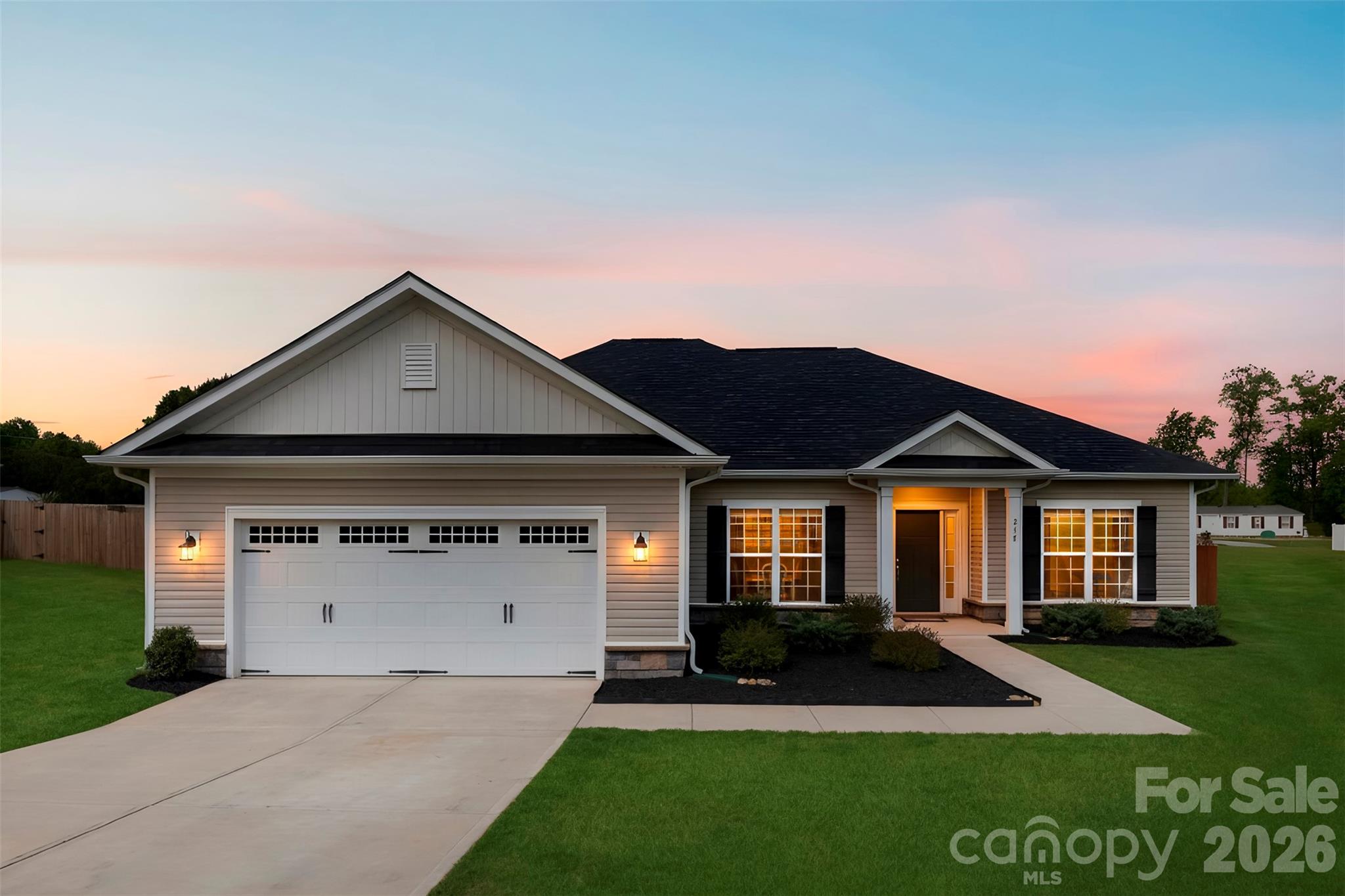 Welcome to this beautifully designed 3-bedroom, 2-bathroom single-family ranch home located in the sought-after Northlake subdivision, a vibrant community filled with stunning new builds. This home features an open-concept layout with an abundance of natural light, creating a bright and inviting atmosphere perfect for both everyday living and entertaining. The spacious kitchen is a true centerpiece, showcasing granite countertops, stainless steel appliances, and custom cabinetry, all seamlessly flowing into the main living area. The thoughtfully designed floor plan offers comfortable living with well-appointed bedrooms and modern finishes throughout. Step outside to enjoy a fully fenced backyard—ideal for added privacy, pets, or outdoor gatherings. Residents of Northlake also enjoy fantastic community amenities, including a pool, walking trails, and a private 10-acre lake. Perfectly situated near Lake Norman, this home offers easy access to outdoor recreation while maintaining a peaceful, country feel—yet still conveniently close to shopping, dining, and everyday essentials. Don’t miss the opportunity to make this exceptional home yours—schedule your showing today!
