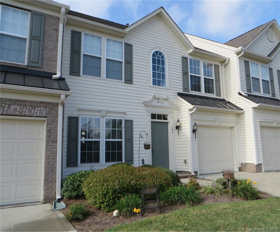 Immaculate & move-in ready town home!  Beautiful wood flooring throughout main level + treads on stairs. Formal Dining accented by crown molding. Kitchen has good counter space, 42" cherry cabinets, & is open to Great Room w/fireplace. Breakfast Nook for casual dining. Half Bath w/pedestal sink.  Master Suite has tray ceiling, double walk-in closets, tile, garden tub, double sinks, sep shower. Guest bath also w/tile flooring. Large secondary BRs. Privacy fence, pretty landscaping, community pool