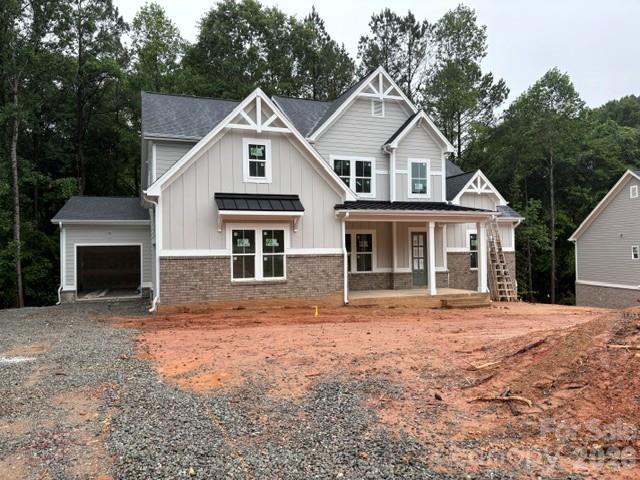 New Construction in beautiful, sought after Falls Cove Neighborhood in Troutman.  The Tamarack floorplan is custom designed to flow nicely for entertaining and everyday living.  The main level features the Luxury Primary Suite that will not disappoint.  A second private bedroom suite with luxury bath and walk in closet.  Plus, a tucked away Powder Room.  Gourmet Kitchen with High End Appliances, large island and huge walk-in Pantry.  A Chef's delight with designer touches like stunning cabinets to ceiling.  All flows effortlessly to the dining area and Great Room with Fireplace and custom built-ins.  Then out to the Rear Covered Porch and Open deck are for grilling.  A drop zone is just inside the 2-Car Garage Entrance.  Large Laundry Room has access to the 3rd Car Garage.  The Upper level has 3 more oversized bedrooms, all with large walk in closets and direct access to a Bath.  Large Rec Room/Medial Room for family time, or entertaining.  Private, Wooded backyard that backs up to HOA-Owned wooded Common Area for additional privacy.  Lots of Designer Upgrades planned throughout this unique and livable floorplan.