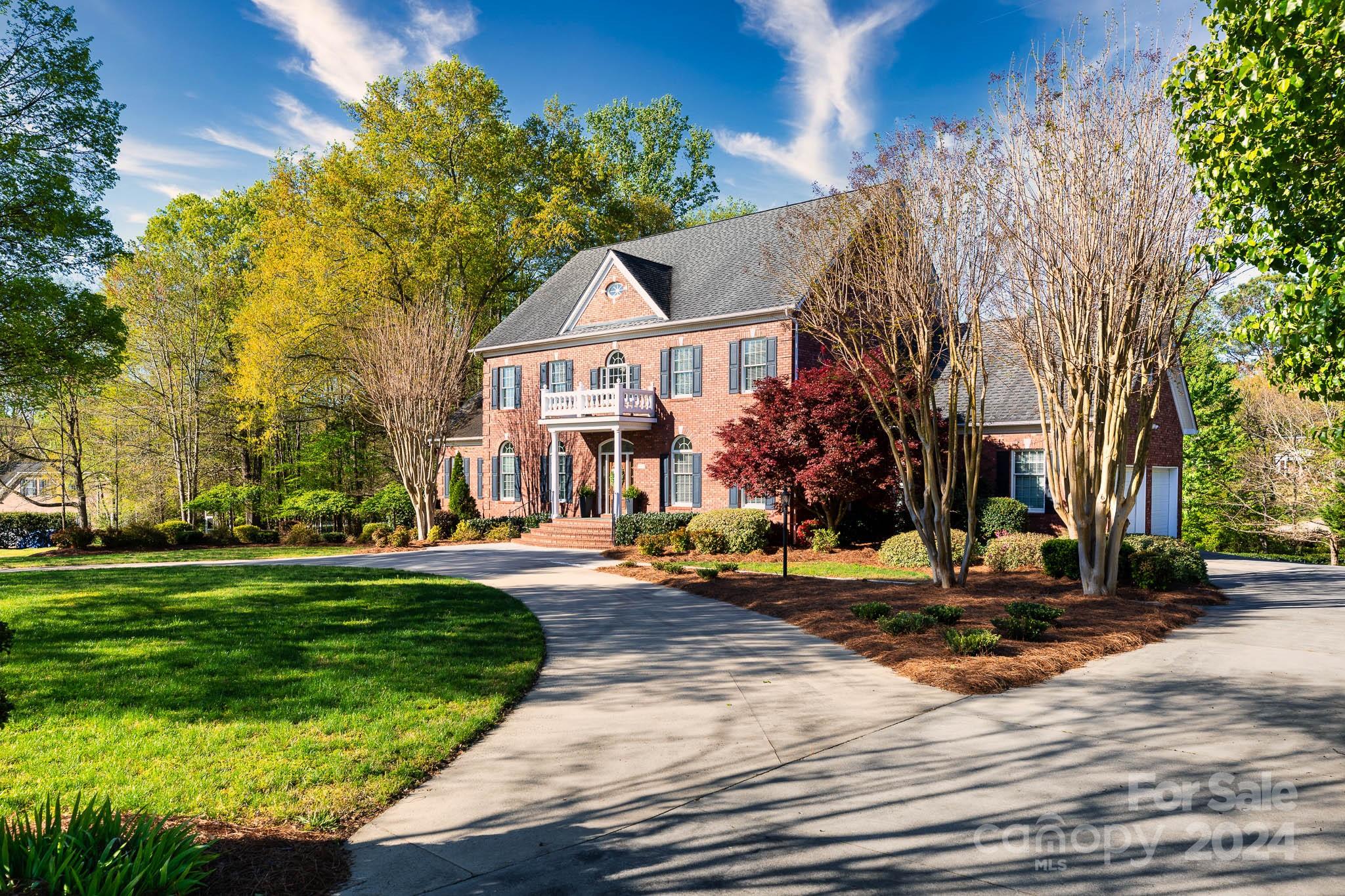 A rare opportunity to live in Harlinsdale, one of Rock Hill's most sought-after neighborhoods. Approaching this stunning home, you'll be captivated by its stately curb appeal. The traditional facade & circular drive welcomes you home. The main floor primary suite has a large walk-in closet, soaking tub & separate shower. Additionally, you will find a beautiful family room with a fireplace. Upstairs are 3 bedrooms, bonus room &  flex room that can be used as an office, playroom etc, with its own half bath! AND this fantastic home also has a LARGE partially finished basement with full bath. This space is perfect for a woodworking or car enthusiast. You could also finish it as separate living quarters with a private entry & garage. Portion of home's interior has been painted & new carpet & vinyl tile installed in 2022. In 2022, SC Licensed Contractor completed unpermitted updates, including closet to a bedroom, fireplace was added & basement shower was installed. Photos taken in 2023.