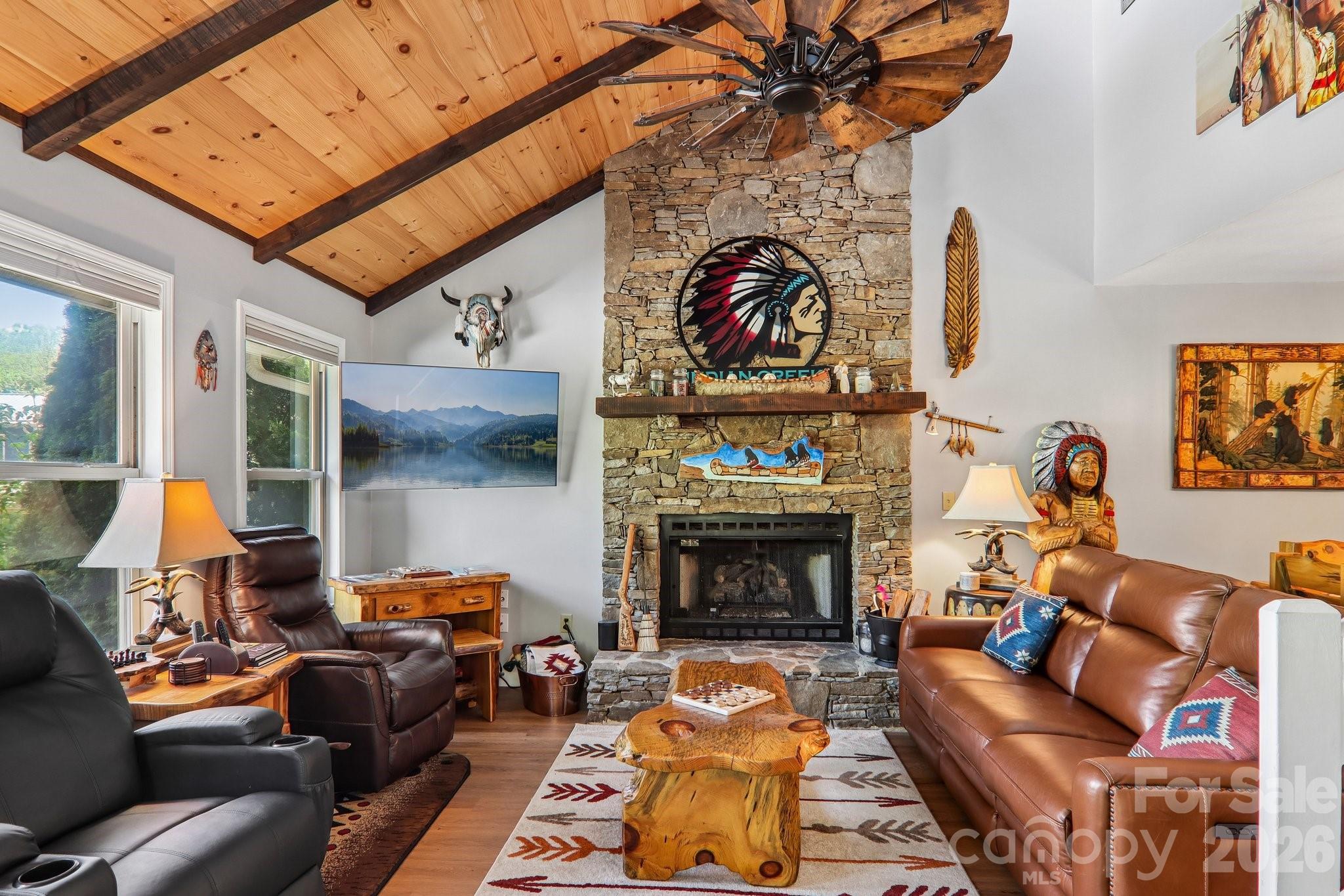 Welcome to your mountain retreat on the highly sought-after WATERFRONT of Jonathan Creek with NO HOA and NOT IN A FLOOD ZONE!!  Nestled in the heart of Maggie Valley, 12 Indian Trace Rd offers the rare opportunity to own a true creekside escape where the soothing sound of rushing water becomes part of everyday life.  

Step onto the back porch and you’re immediately greeted by the peaceful flow of Jonathan Creek just steps away—an ideal setting for morning coffee, evening relaxation, or entertaining guests with a one-of-a-kind natural backdrop. This is mountain living at its finest, blending comfort, tranquility, and the beauty of Western North Carolina.

Inside, you’ll find a home that has been extensively updated, with just about everything thoughtfully remodeled. The interior offers a warm and inviting atmosphere with a layout designed for both everyday living and weekend getaways. Large windows invite in natural light while framing serene views of the surrounding landscape, creating a bright and comfortable space throughout.

Whether you’re looking for a full-time residence, a second home, or an income-producing short-term rental, this property checks all the boxes.

Located just minutes from the best of Maggie Valley, you’ll enjoy easy access to local dining, shopping, outdoor recreation, and year-round attractions—all while tucked away in a peaceful, private setting.

Properties on Jonathan Creek are highly desirable and rarely available in this setting with NO HOA!!  Don’t miss your chance to own a slice of creekside paradise.