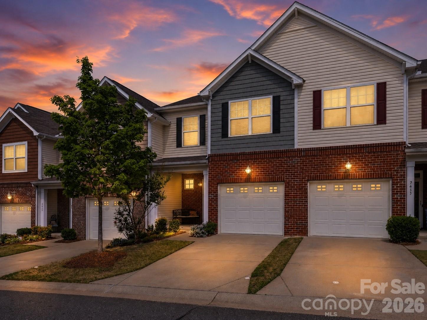 Move-in ready 3BR/2.5BA townhome in The Woodlands – Rock Hill's low-maintenance community! Open floor plan with hardwood floors throughout the main level. Kitchen features granite counters, stainless steel appliances, gas range & breakfast bar flowing into the living room, anchored by a cozy gas fireplace – perfect for entertaining. 

Upstairs, the spacious primary suite offers dual sinks, walk-in tiled shower, soaking tub & huge walk-in closet, plus two additional bedrooms, full guest bath & upstairs laundry room. Covered back patio for outdoor living, plus attached 1-car garage w/ extra overhead storage. HOA covers lawn care, roofing, exterior maintenance, power washing, plus community pool & clubhouse – true lock-and-leave living. 

Minutes to downtown Rock Hill, Ebenezer Park & Lake Wylie, with easy I-77 access for Charlotte commuters. Refrigerator, washer & dryer convey. Priced to sell – schedule your showing today!