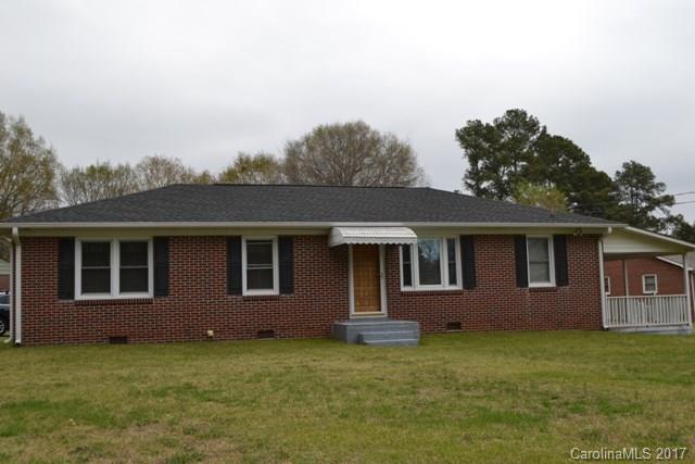 Cute brick home very well maintained on a large corner lot with a beautiful yard.  Pride of ownership shows.  Bonus room opens to a very large covered porch. Newer windows, roof and gutters.  Detached carport enough room for 3 cars.