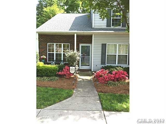 End unit with fenced and paved private backyard. Master on main. Walk to the pool. HOA includes water and sewer. Needs carpet and some paint so seller offering $2000 decorating allowance with acceptable offer