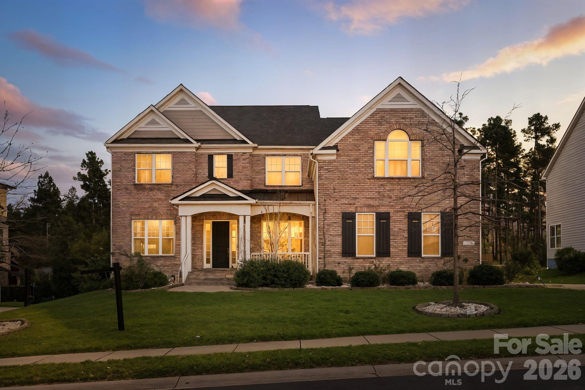 Welcome to 374 Hampton Trail, Shea Homes builder, Located just minutes from Baxter Village and Kingsley, near Tega Cay Golf, parks, and recreation, and approximately 25 minutes to Charlotte Douglas International Airport, this home offers exceptional access for commuters and relocation buyers while maintaining a peaceful residential setting. Zoned for Fort Mill’s highly acclaimed schools, this is a location buyers consistently seek.

A stunning full-brick luxury home located in the heart of Fort Mill’s desirable Habersham community, known for its family-oriented atmosphere, sidewalks, amenities, and top-rated schools. This residence offers the rare combination of timeless architecture, modern livability, privacy, and location — ideal for families, relocation buyers, and executives seeking space and convenience.

Spanning approximately 4,300 square feet, this thoughtfully designed home features soaring 10-foot ceilings, abundant natural light, and elegant finishes throughout. A grand two-story foyer creates an immediate sense of scale and sophistication, leading into formal and casual living spaces that flow seamlessly for both everyday living and entertaining.

The gourmet kitchen serves as the heart of the home, showcasing an oversized island, Quartz countertops, gas cooktop, wall oven, and generous cabinetry — perfect for family gatherings and hosting. It opens directly to the dramatic family room, where tall windows, a cozy fireplace, and architectural details elevate the space.

A highly sought-after main-level guest suite with a full bedroom and bathroom provides flexibility for multi-generational living, visitors, or a private home office.

Upstairs, the primary suite is a private retreat featuring a spa-inspired bathroom, separate jacuzzi tub and shower, and an expansive walk-in closet with custom built-ins. Step outside to the second-level balcony, shared with the oversized bonus room — an ideal space for morning coffee, quiet evenings, or entertaining. The bonus room is wired for surround sound, making it perfect for movie nights or a media lounge. Two additional bedrooms share a Jack-and-Jill bathroom, offering both functionality and comfort.

The home sits on a flat, private backyard with mature landscaping and ample space for a future pool, outdoor entertaining, or play — a true extension of the home’s lifestyle appeal.

Additional highlights include:
 • 3-car garage
 • Hardwood floors and plush New Carpet
 • High ceilings throughout
 • Custom closets and storage
 • Quiet, sidewalk-lined neighborhood with amenities

This is more than a home — it’s a lifestyle defined by space, privacy, luxury, top schools, and unmatched convenience

Enjoy neighborhood community pool, clubhouse and playground.
