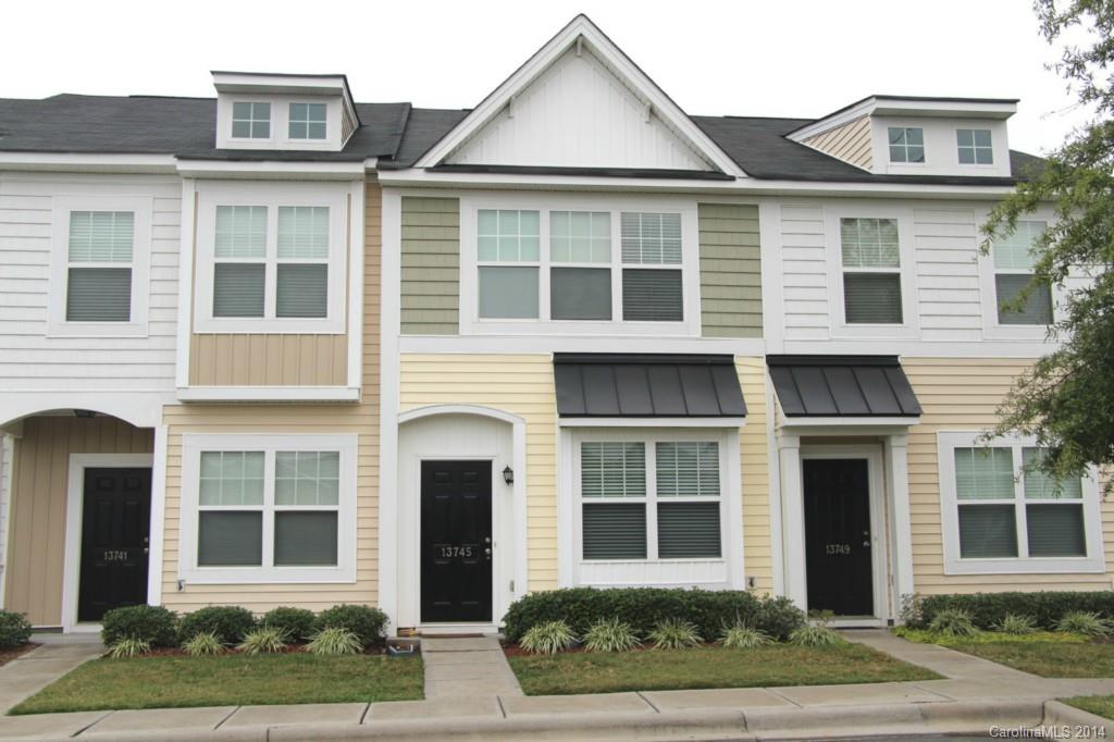 PRICED TO SELL! Unique and spacious DUAL MASTER 2 bed 2.5 bath, with BRAND NEW - PAINT, LAMINATE HARDWOOD in LR and DR & VINYL in kitchen. Don't miss out on this LIKE NEW, town home with electric fireplace (w/remote) arched entrances, vaulted ceilings, plant shelves and more!! You will feel right at home in this stylish and open floor plan. Close to Carowinds, Rivergate, (Cabelas - coming spring of next year) Charlotte Premier Outlet, 15 minutes to light rail and convenient to 485 and 77.