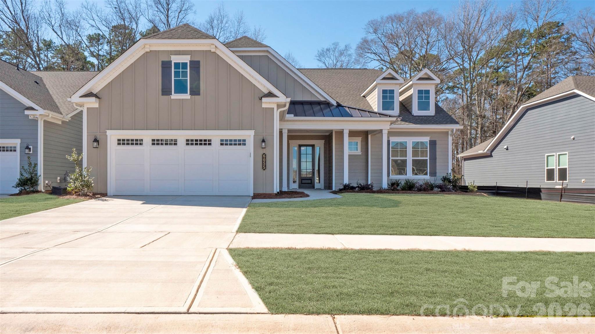 **NEW CONSTRUCTION**This Riley floorplan offers 3 Bedrooms, 3 Full Baths, Powder Room, and 2-Car Garage, providing plenty of room for everyday living. No home behind you, this homesite is for those seeking a peaceful retreat with private backyard wooded views. Entertain on your rear patio with stone pavers and a 7' built-in grill island. The Owner's Suite and covered lanai have been extended 4ft for added space and relaxation.  The In-Law Suite features its own living area, wet bar, ensuite bathroom with shower, is ideal for guests or multi-generational living. High-end finishes include lighted mirrors in the Owner’s Bath, Glimmer foyer chandeliers, faux wood blinds, Shaw EVP flooring, and tile in the laundry and bathrooms. The kitchen boasts a CHEF Kitchen Cabinet & Appliance Package with upgraded MONOGRAM appliances, Quartz countertops, and a Farmhouse Cast Iron Sink.