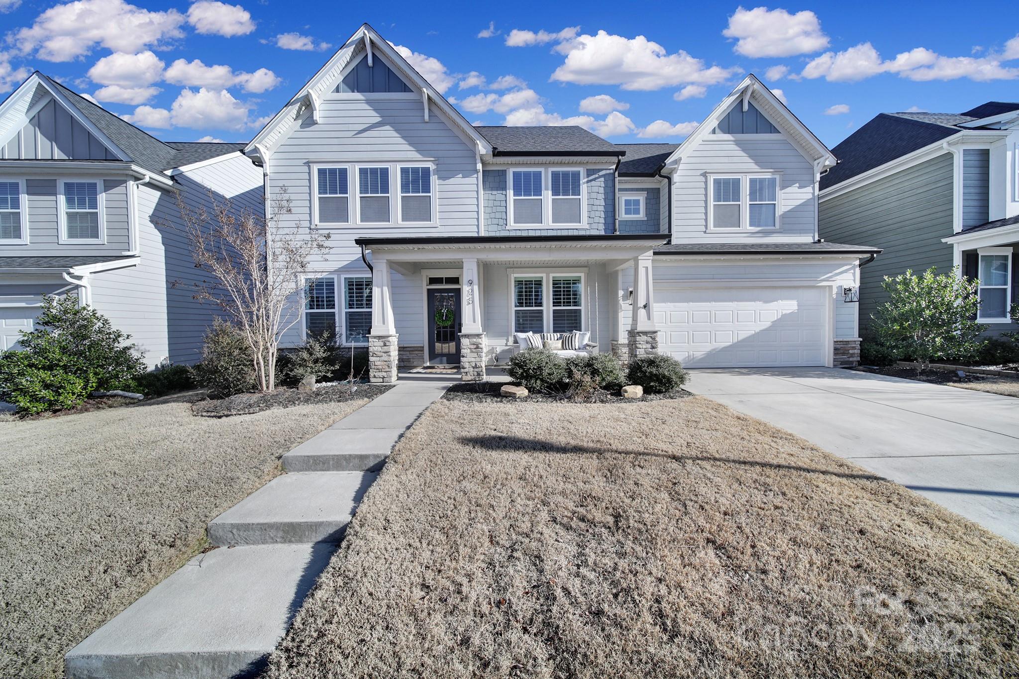 Welcome to this stunning 5-bedroom home in the highly sought-after Masons Bend community, located along the scenic Catawba River. This meticulously designed residence offers an open floor plan with high-end finishes including plantation shutters, shiplap, stunning light fixtures and luxury wallpaper. The main level features a gorgeous gourmet kitchen, a home office and a spacious guest room. The perfect layout for work and relaxation. Upstairs, a loft with custom built-ins is the ideal space for play or study. The elegant design is complemented by a 2-car garage with epoxy floors and a fenced backyard. Enjoy outdoor living with an extended patio, wired for a hot tub, making this home an entertainer's dream. Rich amenities include hiking trails, club house, gym, yoga room, 2 pools, gas fire pit, playground, parks and river access. Award winning schools. Easy access to I-77. Short drive to uptown and the airport. Don't miss the opportunity to own this exquisite property in Fort Mill!