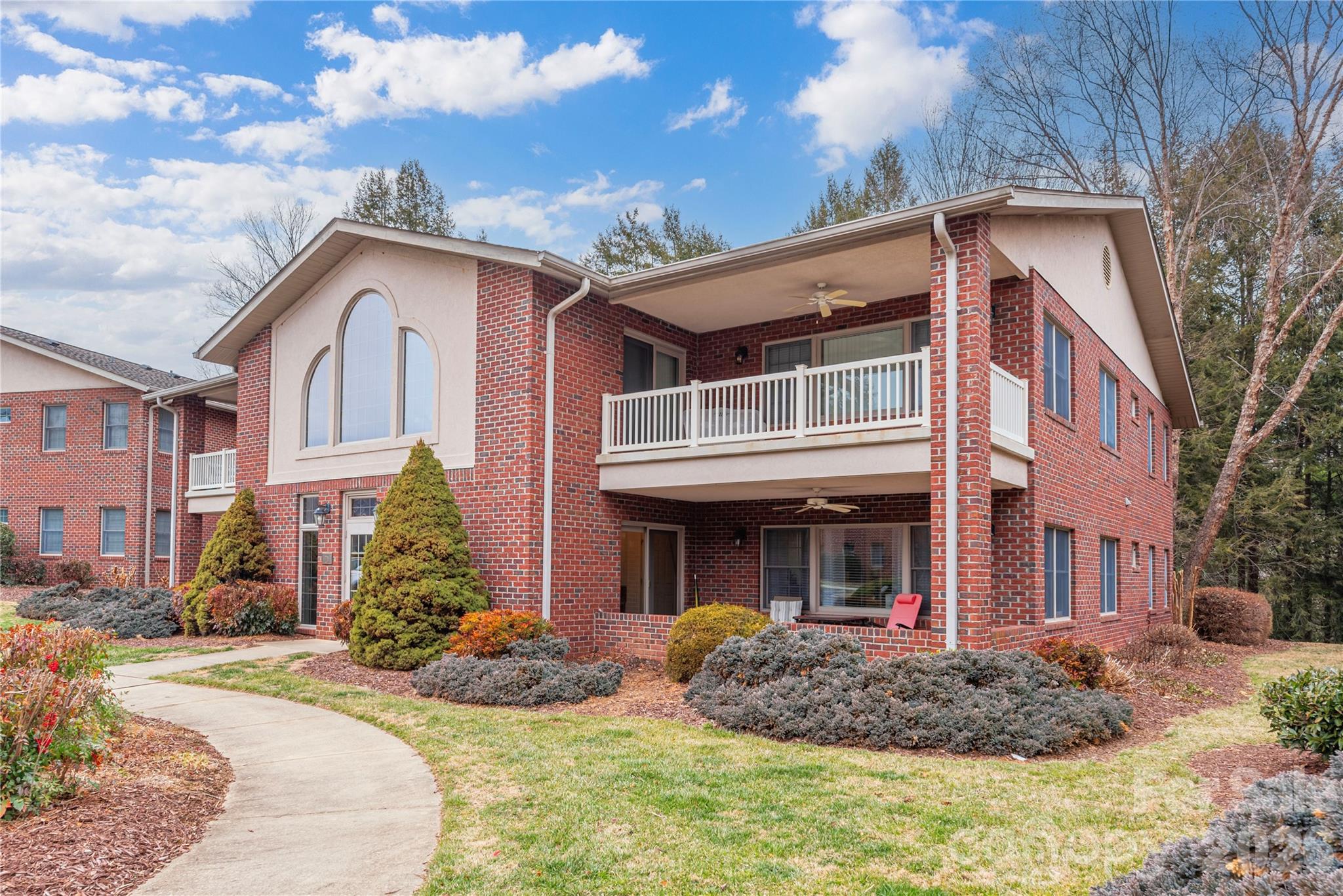 Come live where the eagles soar!  This three-bedroom, two full bath brick ground level home (no steps!) is a RARE opportunity in the highly coveted Lake Junaluska community tucked into the Blue Ridge Mountains of Western, NC.  Walk right out of your door and enjoy the 6-mile walking trail around the lake with access to the pool, pickleball, tennis courts, playground, mini-golf, basketball, kayaking, fishing, shuffleboard, a quaint bistro, campus security and more- would be a perfect second home, retirement home or primary residence.  Vacation rentals are not permitted.  Conveniently located just 10 minutes to Waynesville and 30 minutes to Asheville, with easy access to shopping, dining, many fabulous golf courses, and more.